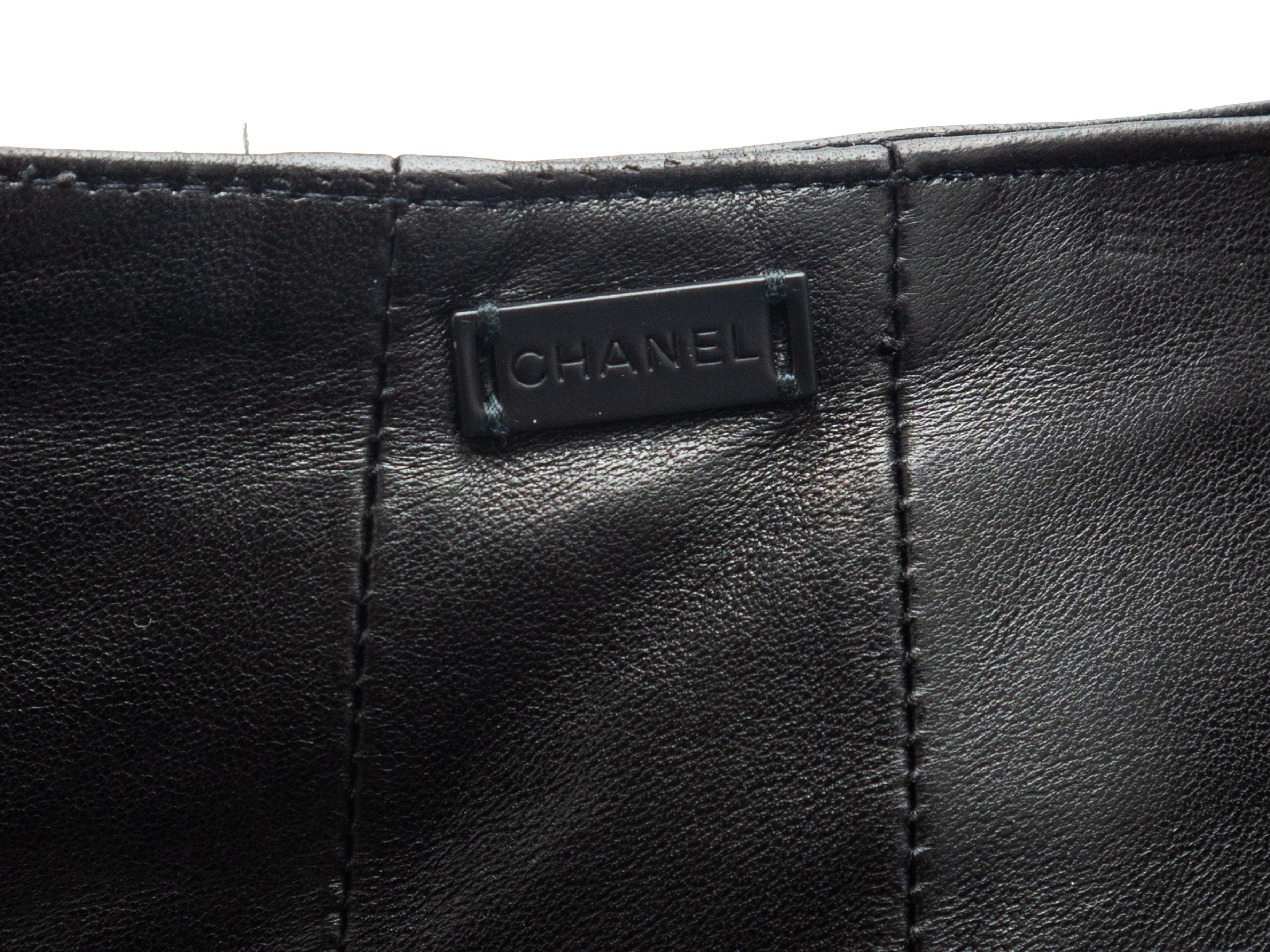 Product details: Black leather pants by Chanel. No pockets. Designer size 40. 30
