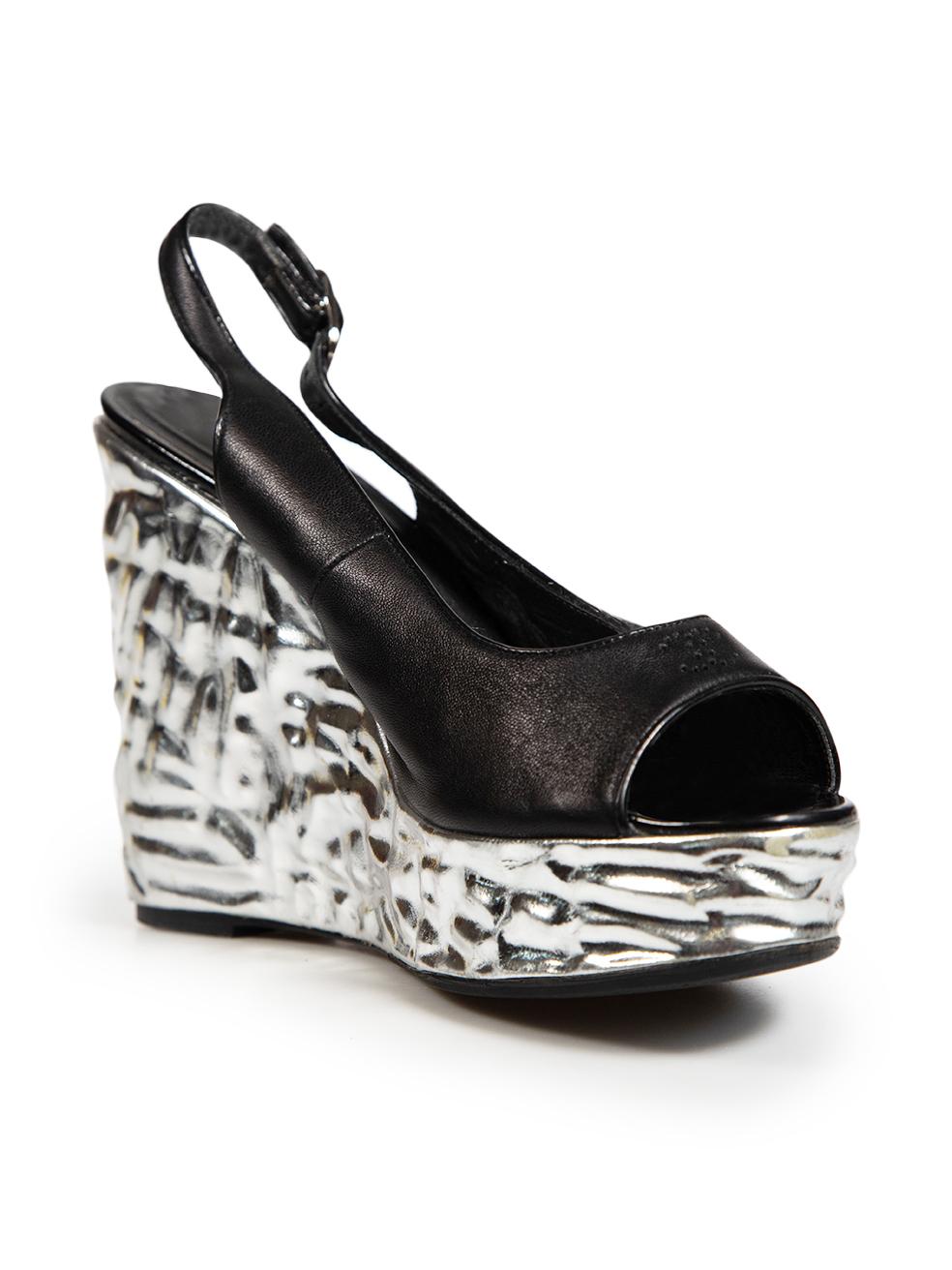 CONDITION is Good. Minor wear to sandals is evident. Small abrasions to the front, sides, back and heels of both shoes. Light tarnishing to the buckle hardware on this used Chanel designer resale item. Please note that the shoes have been resoled.