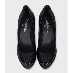 Chanel Black Leather Pumps with Patent Cap Toe - Size 38.5