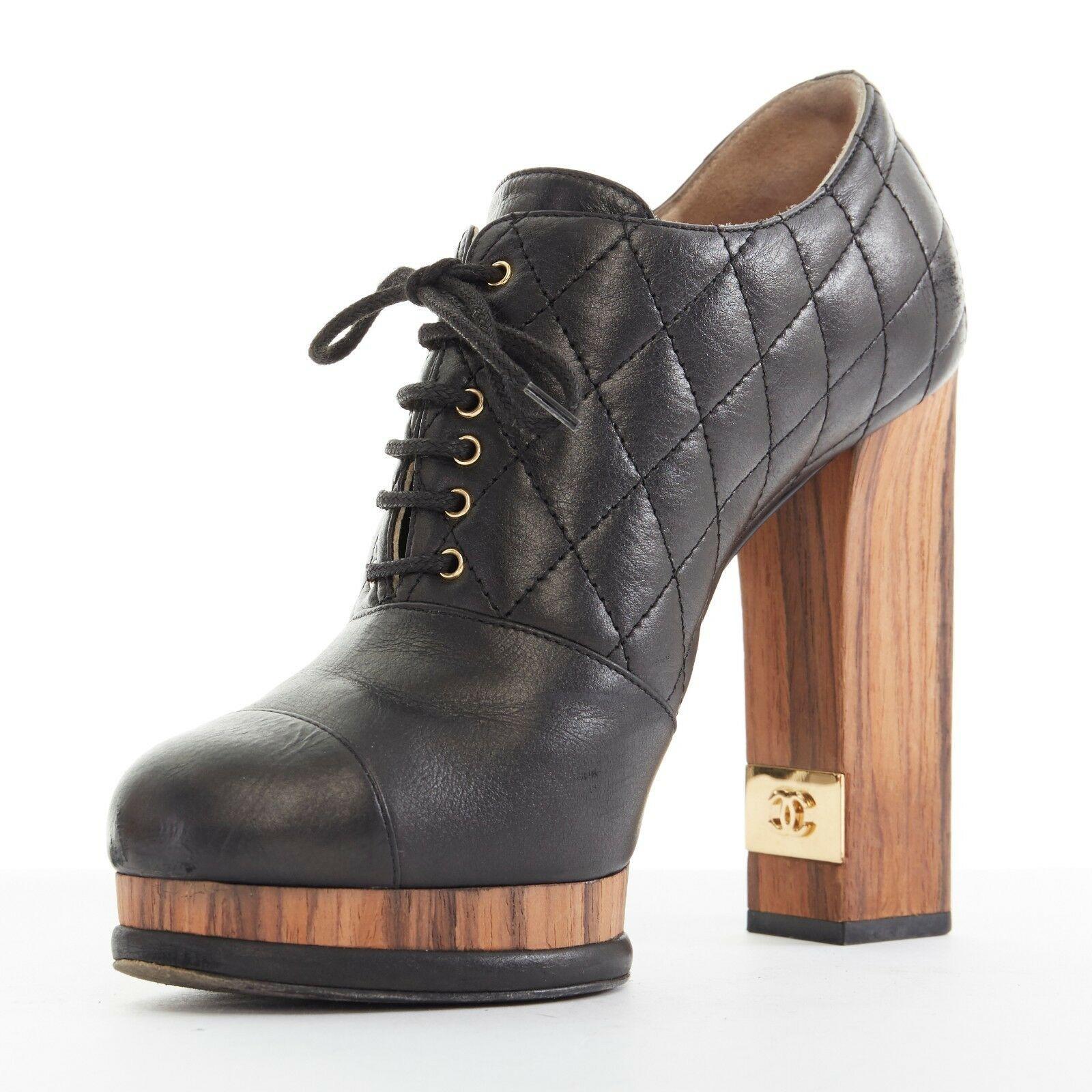 Black CHANEL black leather quilt stitched wooden platform CC chunky heel bootie EU39C