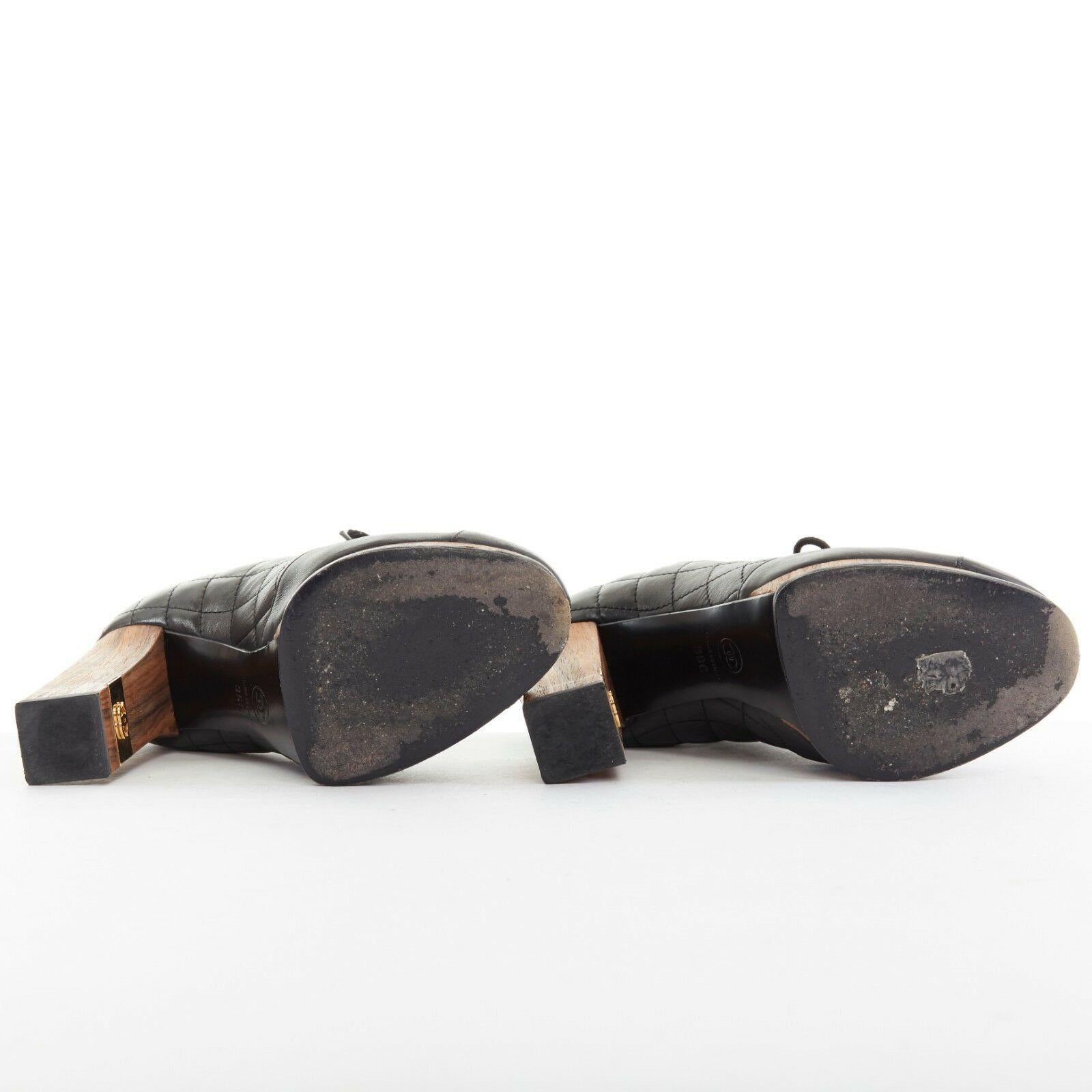 Women's CHANEL black leather quilt stitched wooden platform CC chunky heel bootie EU39C