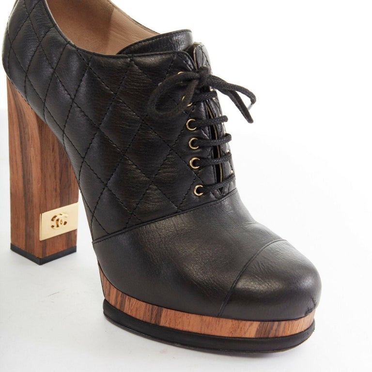 CHANEL black leather quilt stitched wooden platform CC chunky heel bootie  EU39C at 1stDibs