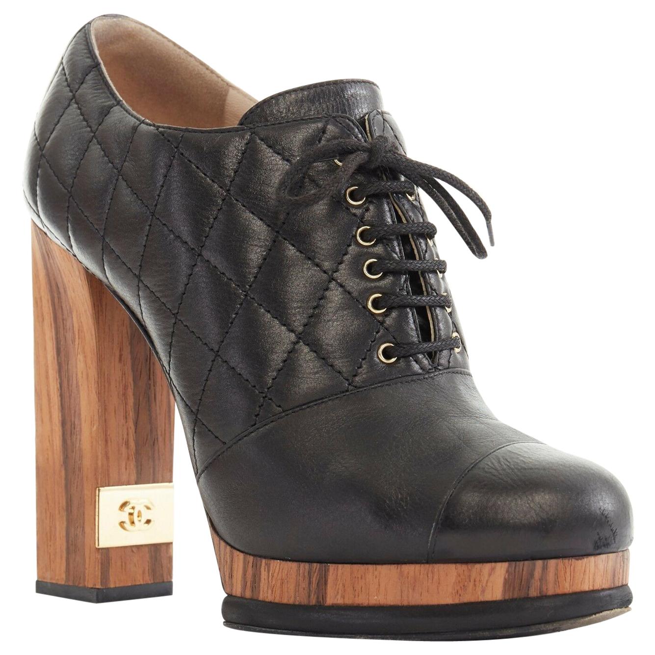 CHANEL black leather quilt stitched wooden platform CC chunky heel bootie EU39C