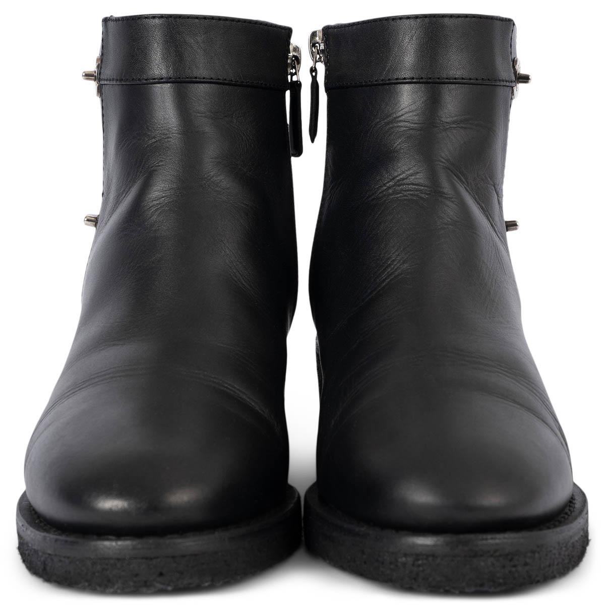 100% authentic Chanel ankle-boots in black smooth calfskin featuring silver-tone metal CC turn-lock closure. Open with zipper on the inside. Have been worn and are in excellent condition. Come with dust bag. 

REV Collection

Measurements
Model	REV