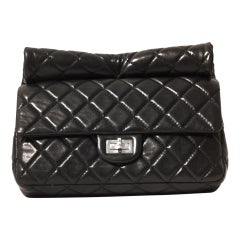 Chanel Black Leather Roll Handle Reissue Clutch
