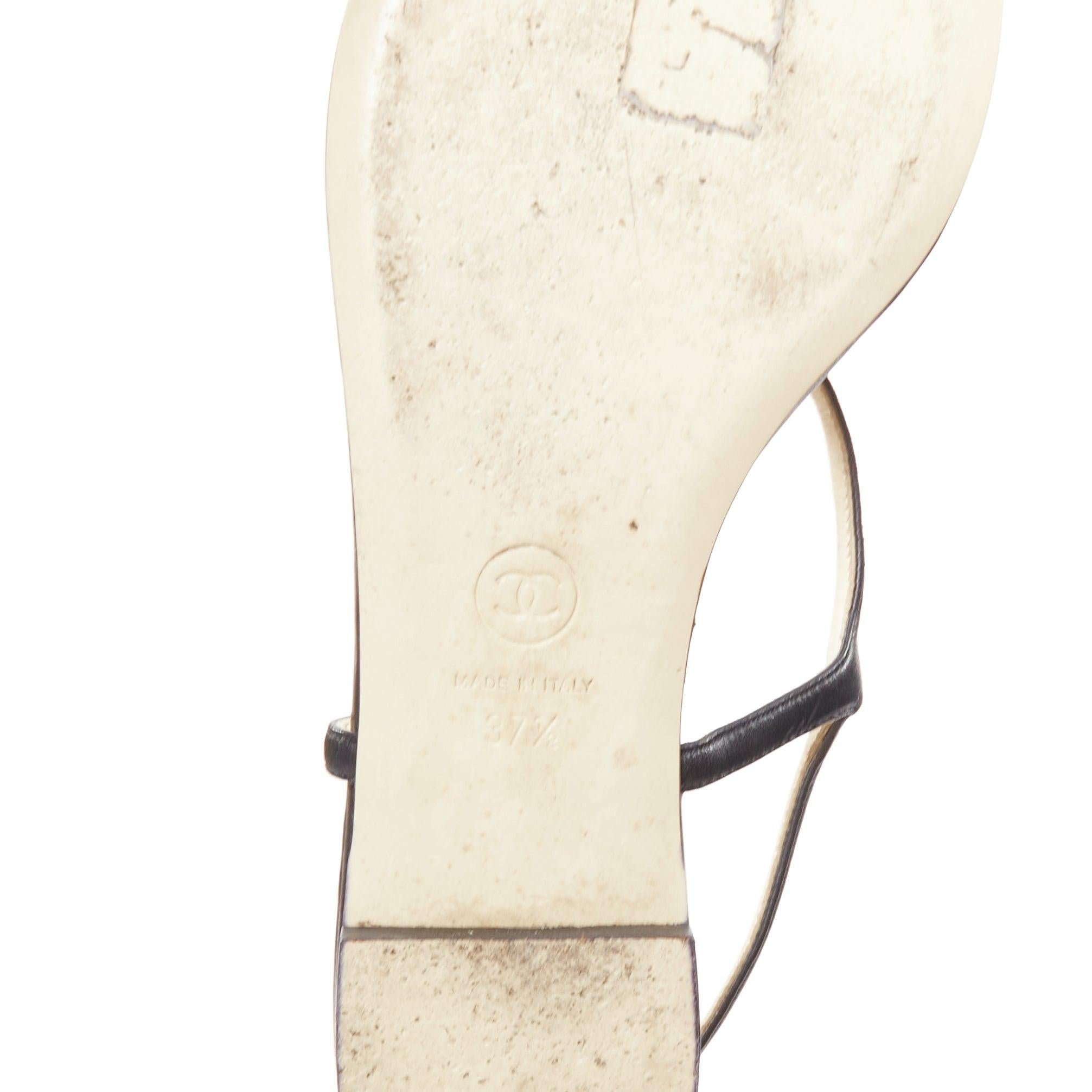 CHANEL cuir noir argenté logo CC camélia plat T strap sandales EU37.5 en vente 5
