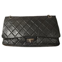 Chanel black leather silver hardware double flap shoulder bag