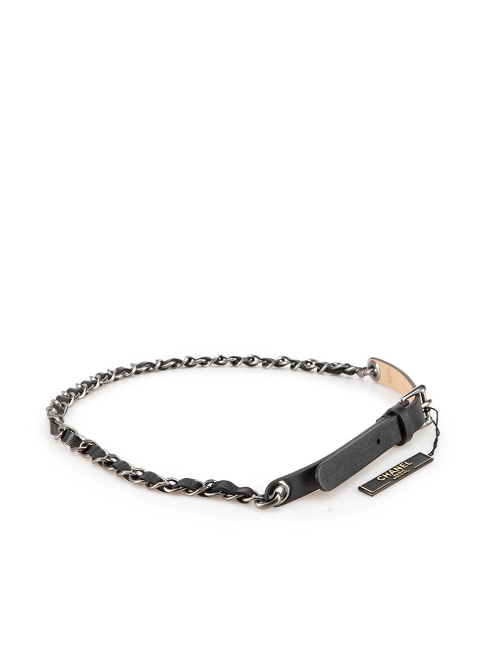 CONDITION is Never worn, with tags. No visible wear to belt is evident on this new Chanel designer resale item.



Details


Black

Leather

Skinny belt

Silver tone hardware

Metal chain woven detail



 

Made in Italy 

 

Composition

EXTERIOR:
