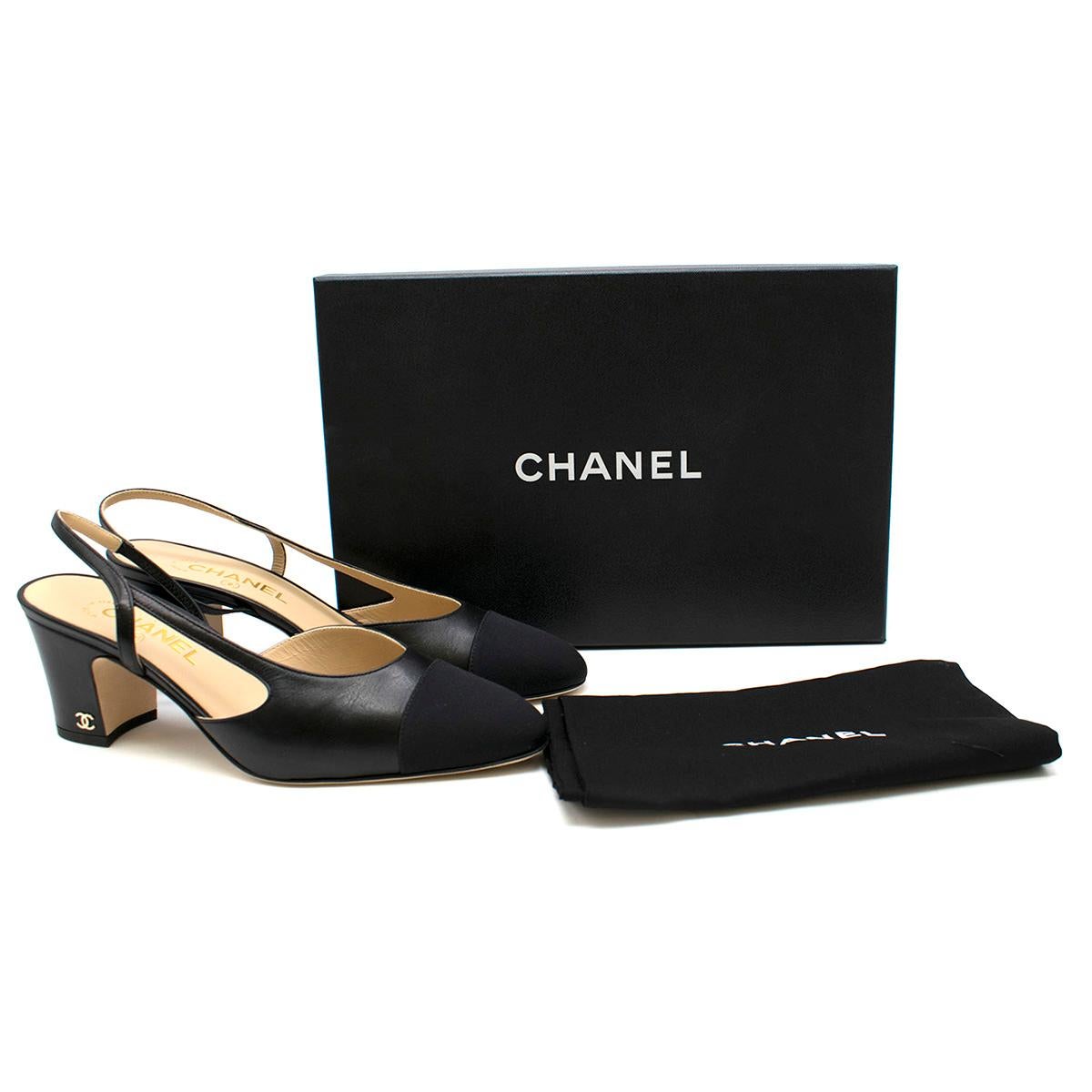 Chanel Black Leather Slingback Block Heels 

- Black Mule Heels
- Leather body, fabric toe 
- Rounded, slim toeline
- Slingback strap, stretch 
- Block heel 
- Leather sole 
- Gold toned signature logo at heel. 

This item comes with an additional