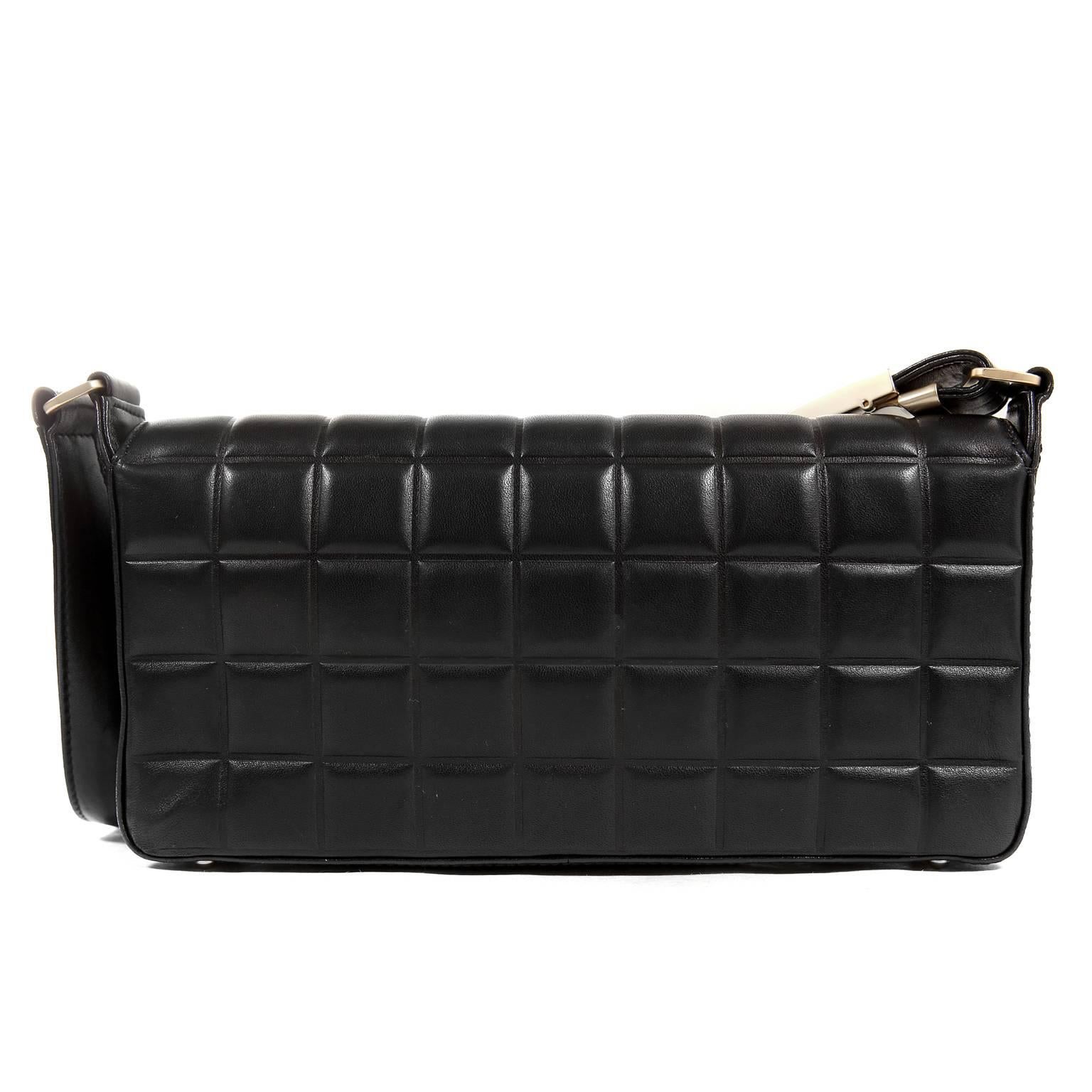Chanel Black Leather Square Quilted Day Bag- MINT conditio
The medium silhouette is perfectly sized for day or evening and easily carries all the essentials.
Black leather is quilted in square pattern with matte gold hardware accents.  A concealed