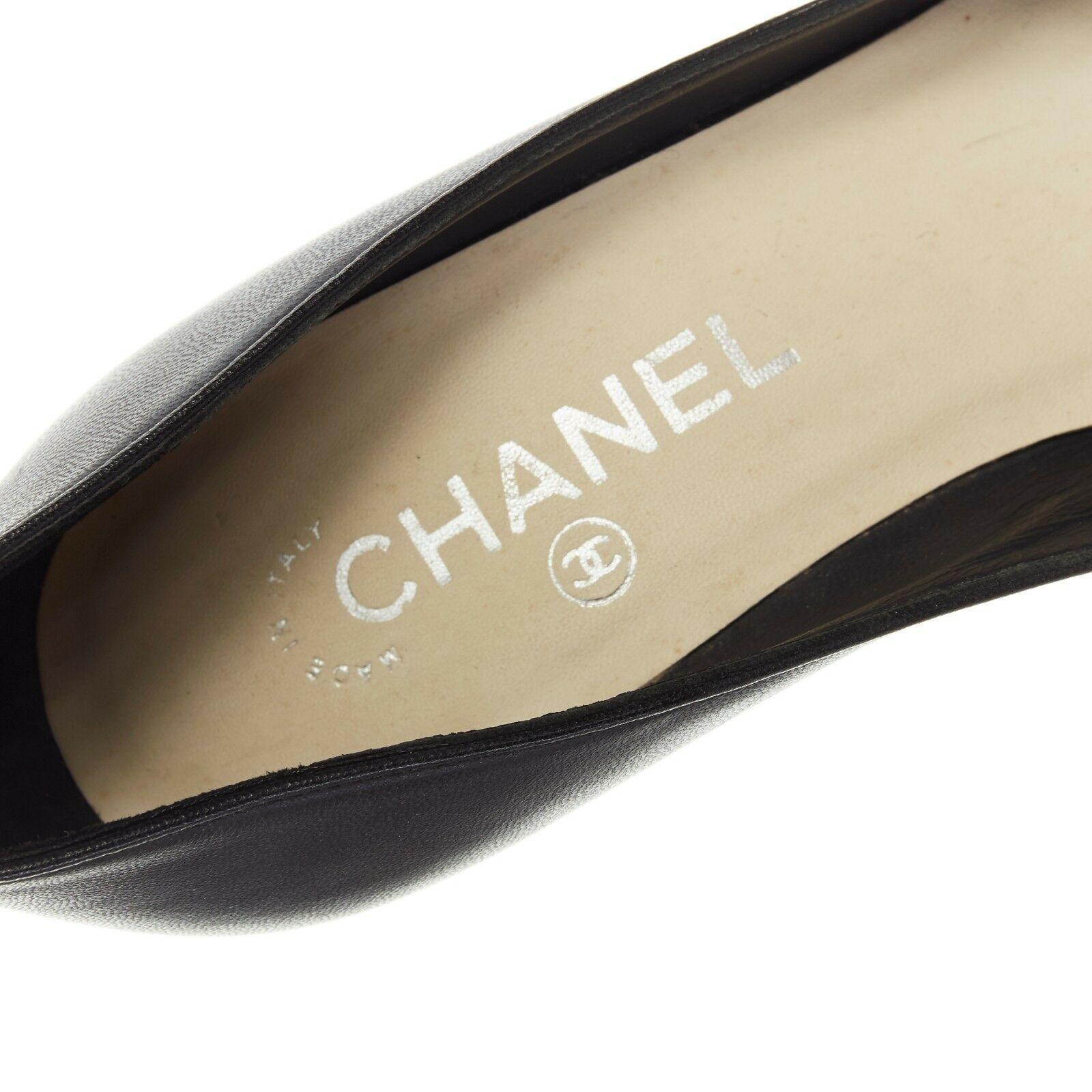 CHANEL black leather toe cap logo debossed metal plate platform chunky pump EU37 2