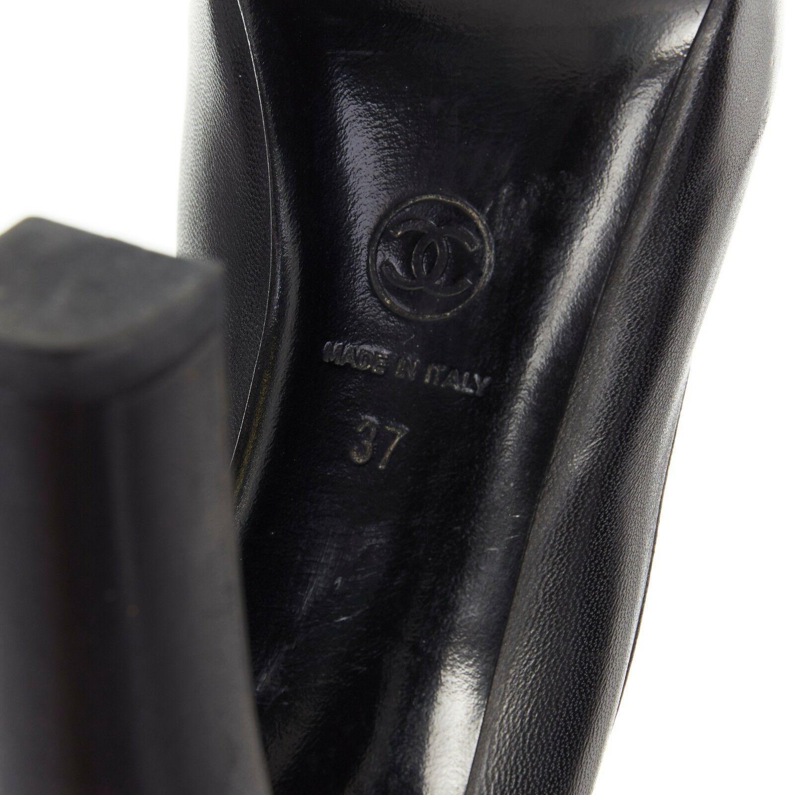 CHANEL black leather toe cap logo debossed metal plate platform chunky pump EU37 4