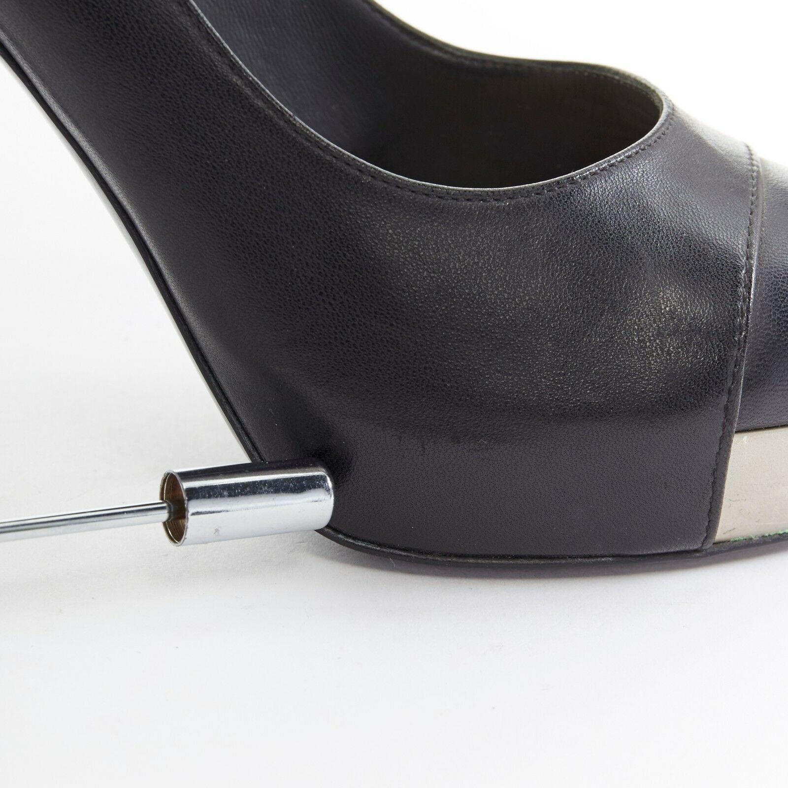 Women's CHANEL black leather toe cap logo debossed metal plate platform chunky pump EU37