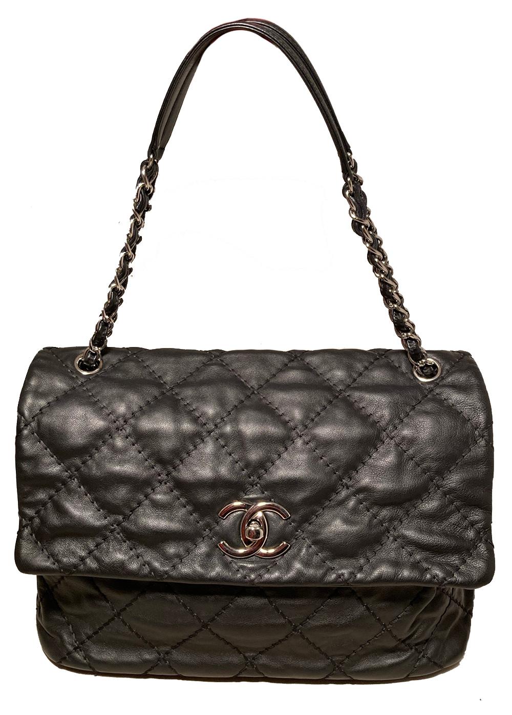 Chanel Black Leather Ultimate Stitch Classic Flap Shoulder Bag in excellent condition. Black calfskin leather exterior trimmed with thick black top stitching and silver hardware. Double woven chain and leather shoulder straps with centered leather