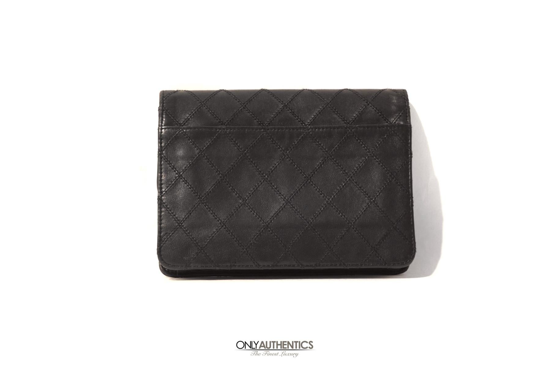 Chanel Vintage Black Leather Wallet- excellent condition 
 From approximately 1990, this classic piece is a timeless addition to any collection.
Black leather is stitched in signature Chanel diamond pattern.  Silver interlocking CC insignia conceals