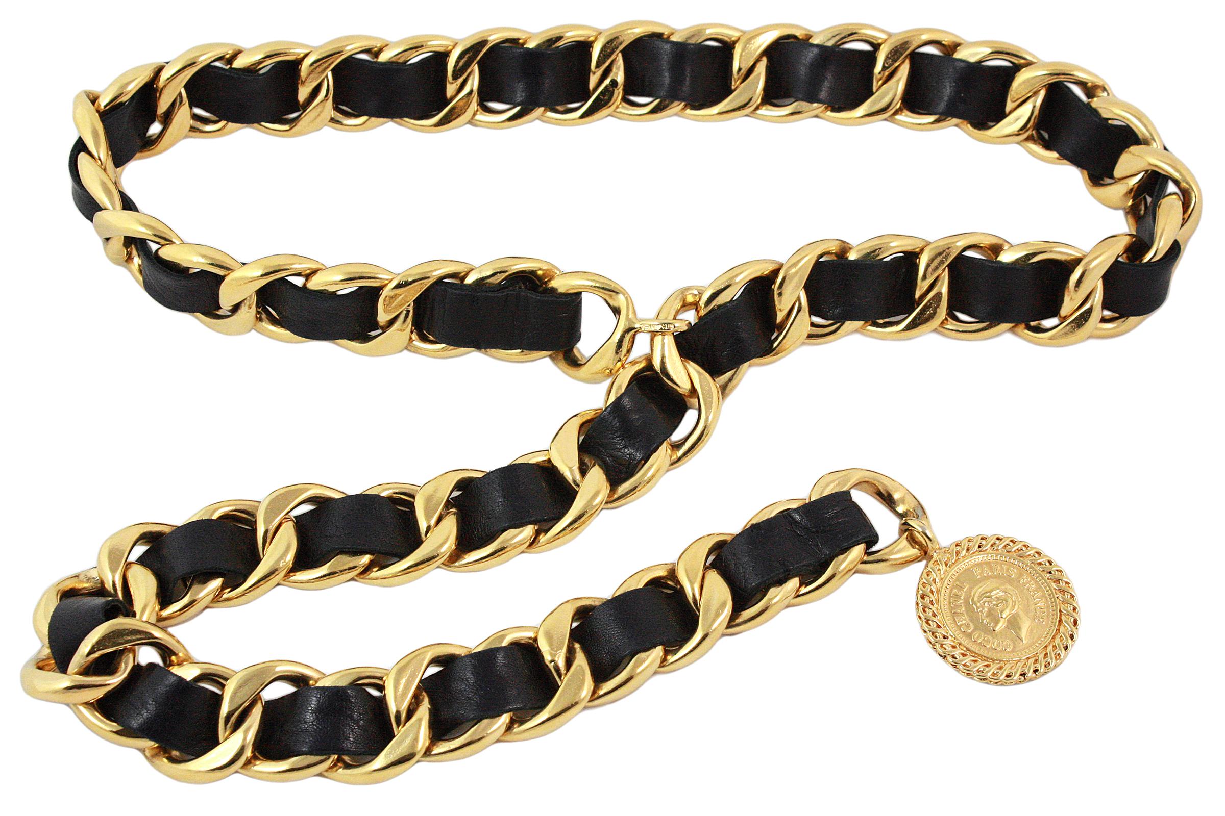 Chanel Vintage Black Leather Woven Gold Chain Belt
Features goldtone coin 
Color: Black and goldtone
Hardware: Goldtone
Materials: Leather and metal
Closure/Opening: Hook closure
Comes with black storage box
