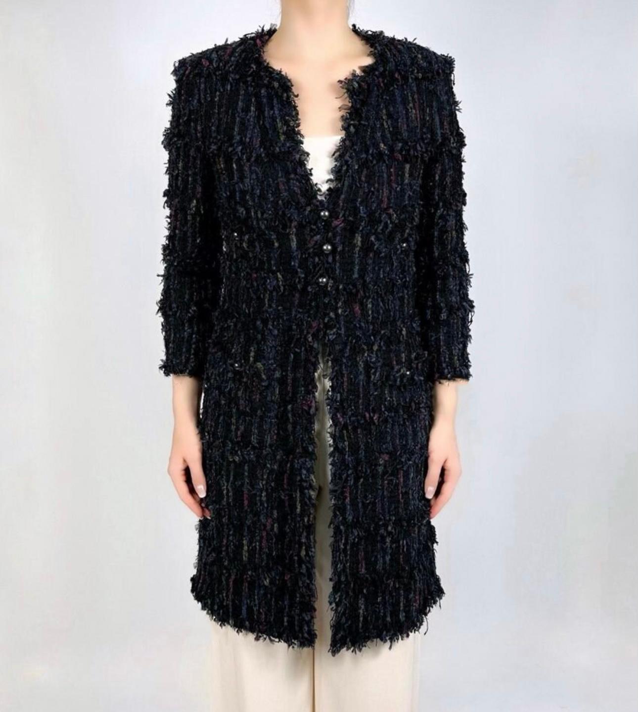 Fabulous Chanel lesage tweed coat / jacket with CC logo buttons
Lined with silk. 
Size mark 40 FR / Condition: is pristine