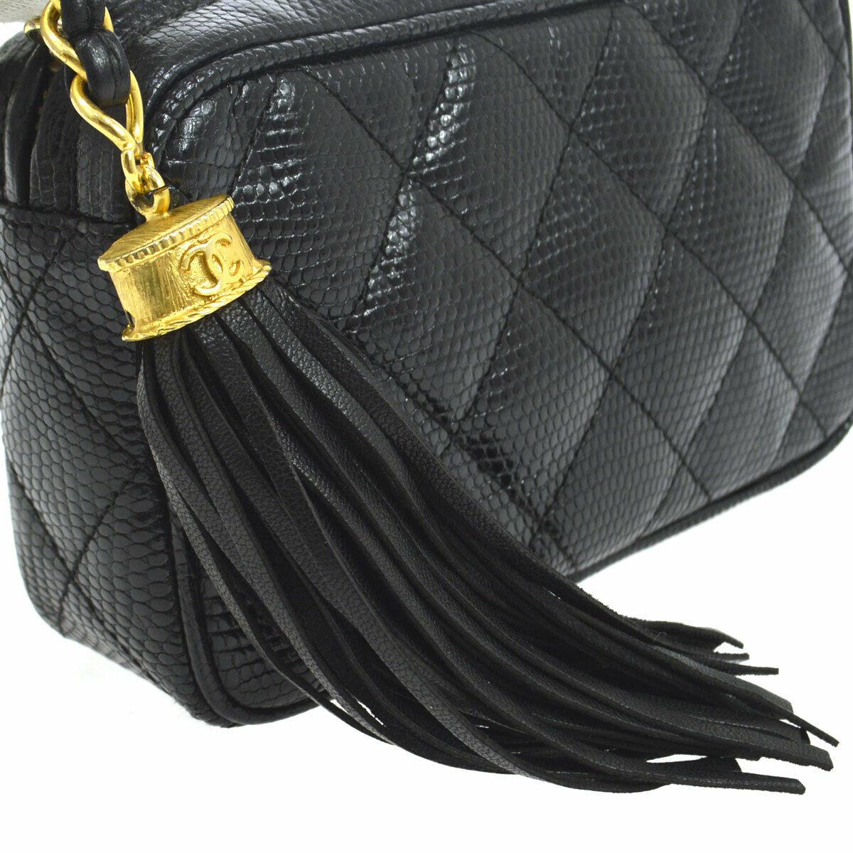 Chanel Black Lizard Exotic Leather Gold Tassel Small Evening Clutch Bag

Lizard
Gold tone hardware
Leather lining
Date code present
Made in France
Measures 6.25