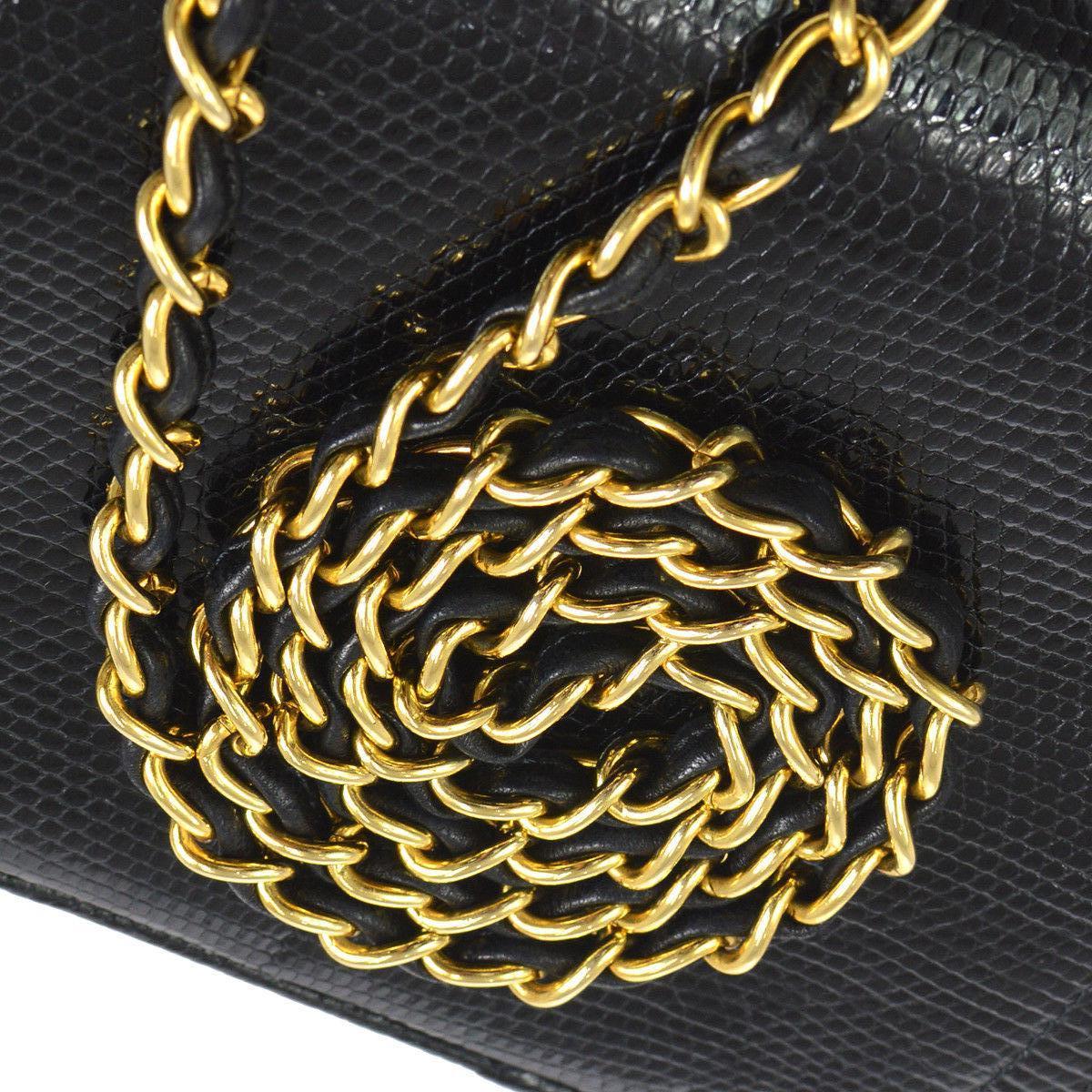 Chanel Black Lizard Half Moon Leather Evening Clutch Shoulder Flap Bag in Box

Lizard
Leather
Gold tone hardware
Leather lining
Date code present
Made in France
Shoulder strap drop 17.5