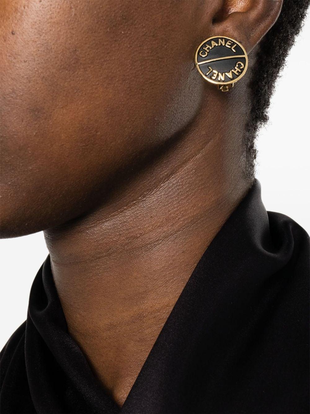 Women's  Chanel Black Logo Clip-On Earrings For Sale