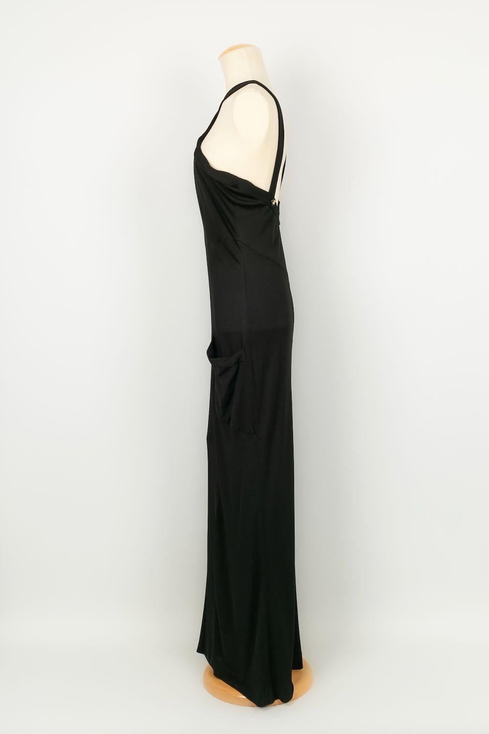 Chanel - (Made in France) Long dress, black. Gold metal and resin buttons. Size indicated 42FR. Summer 1997 collection.

Additional information:
Dimensions: Length: 155 cm
Condition: Good condition
Seller Ref number: VR217