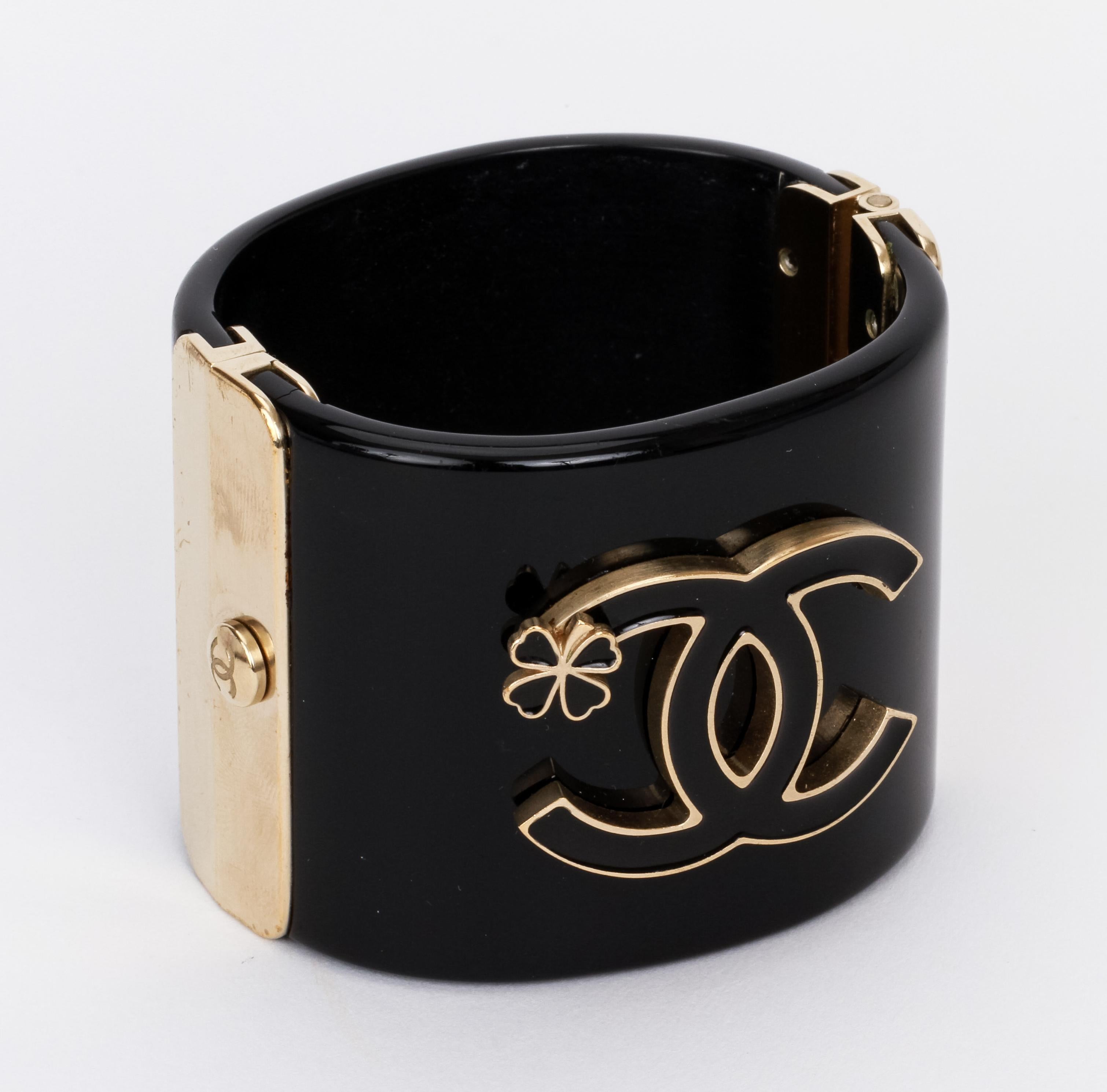 Chanel Black Lucite Hinged Oval CC Oval Cuff Bracelet with Box In Excellent Condition For Sale In West Hollywood, CA