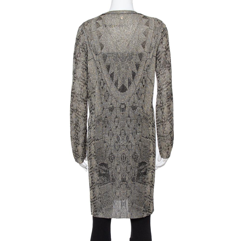 Chanel delights us with this wonderful cardigan. It is styled with a long hem, long sleeves, and front buttons. The knit cardigan will be an ideal addition to your closet. Wear it with a host of outfits to deliver a classy look.