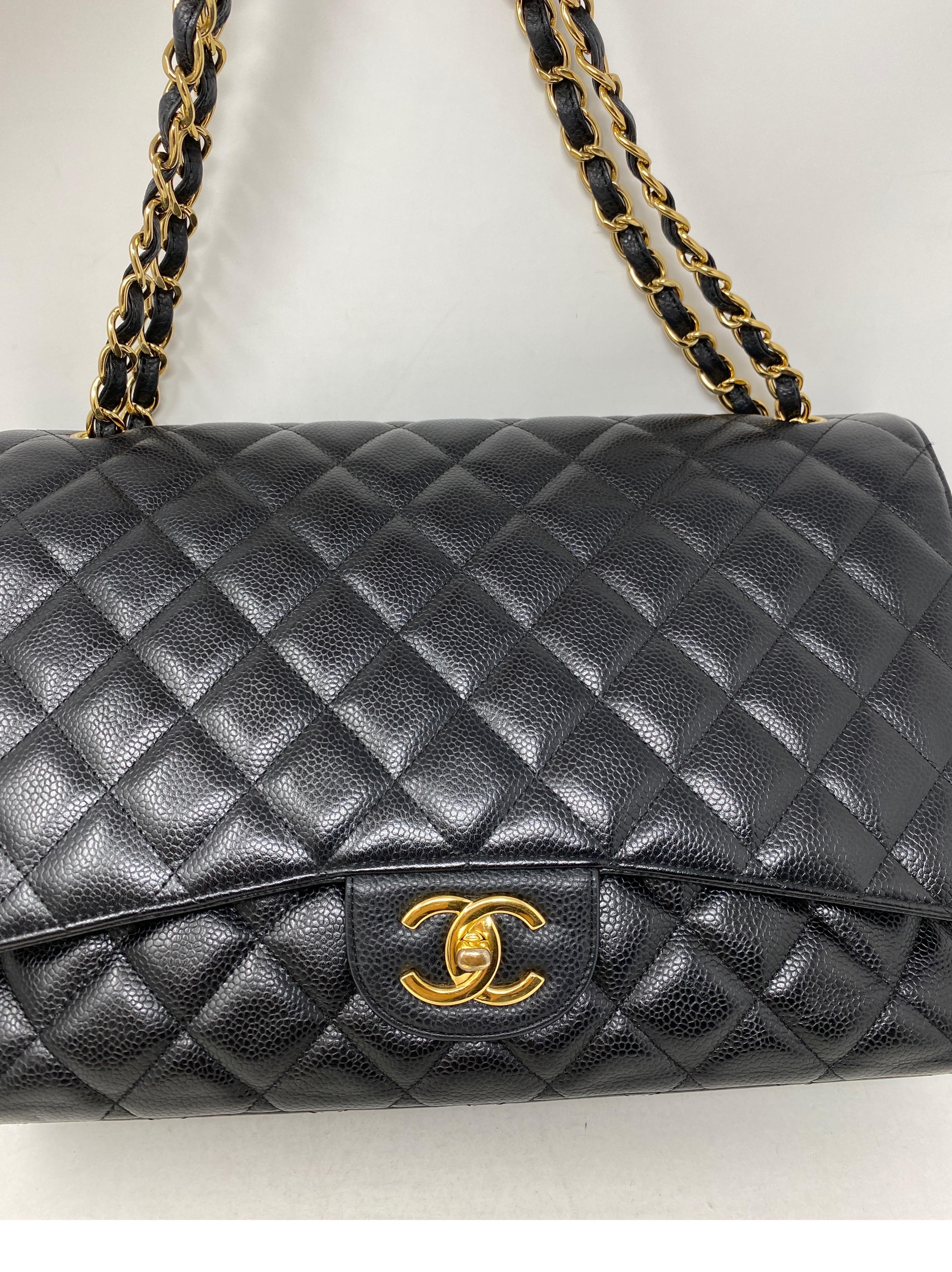 Women's or Men's Chanel Black Maxi Double Flap Bag