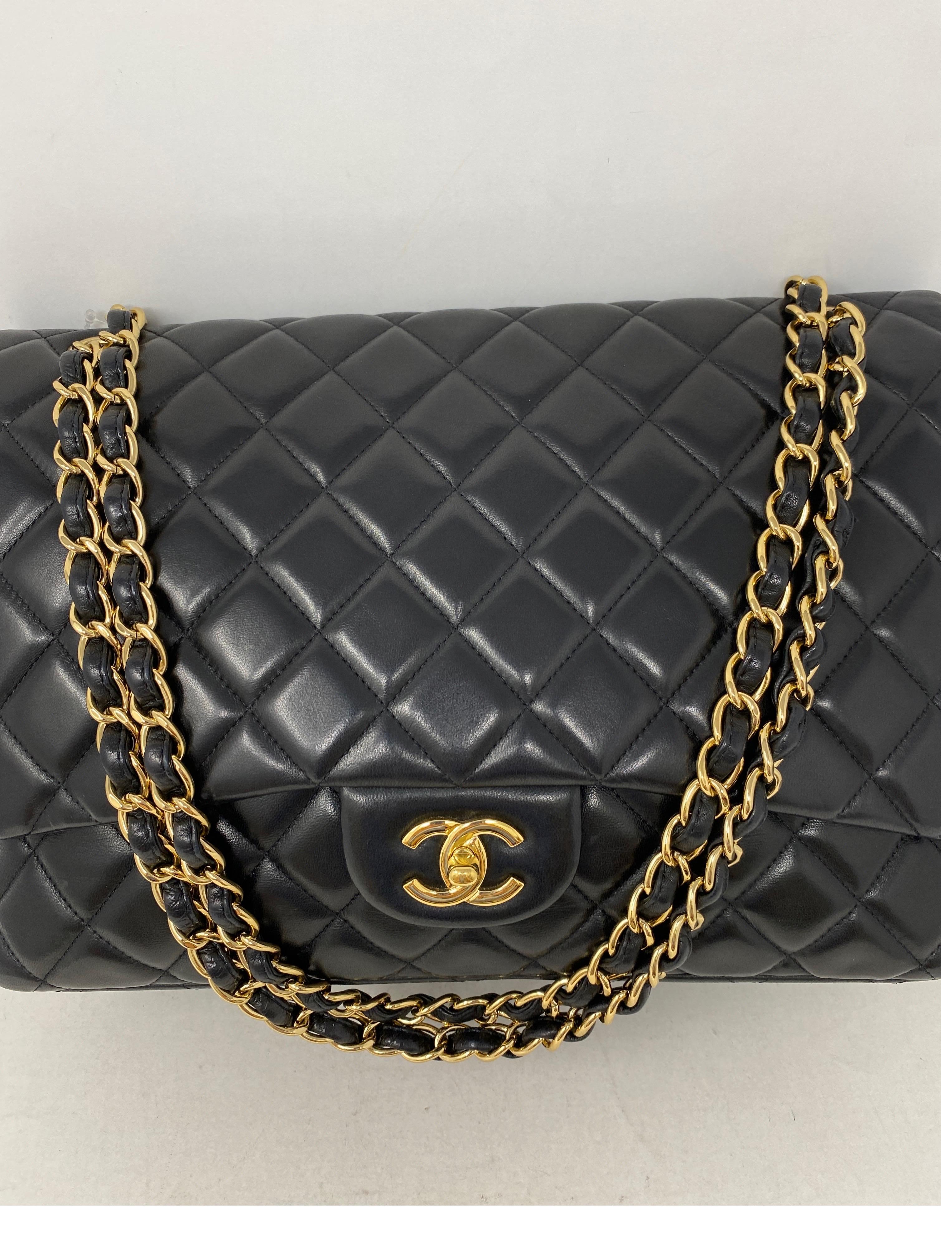 Chanel Black Maxi Lambskin Single Flap Bag. Gold hardware. Excellent condition. Can be worn crossbody or doubled as a shoulder bag. Interior clean. Includes authenticity card. Guaranteed authentic. 