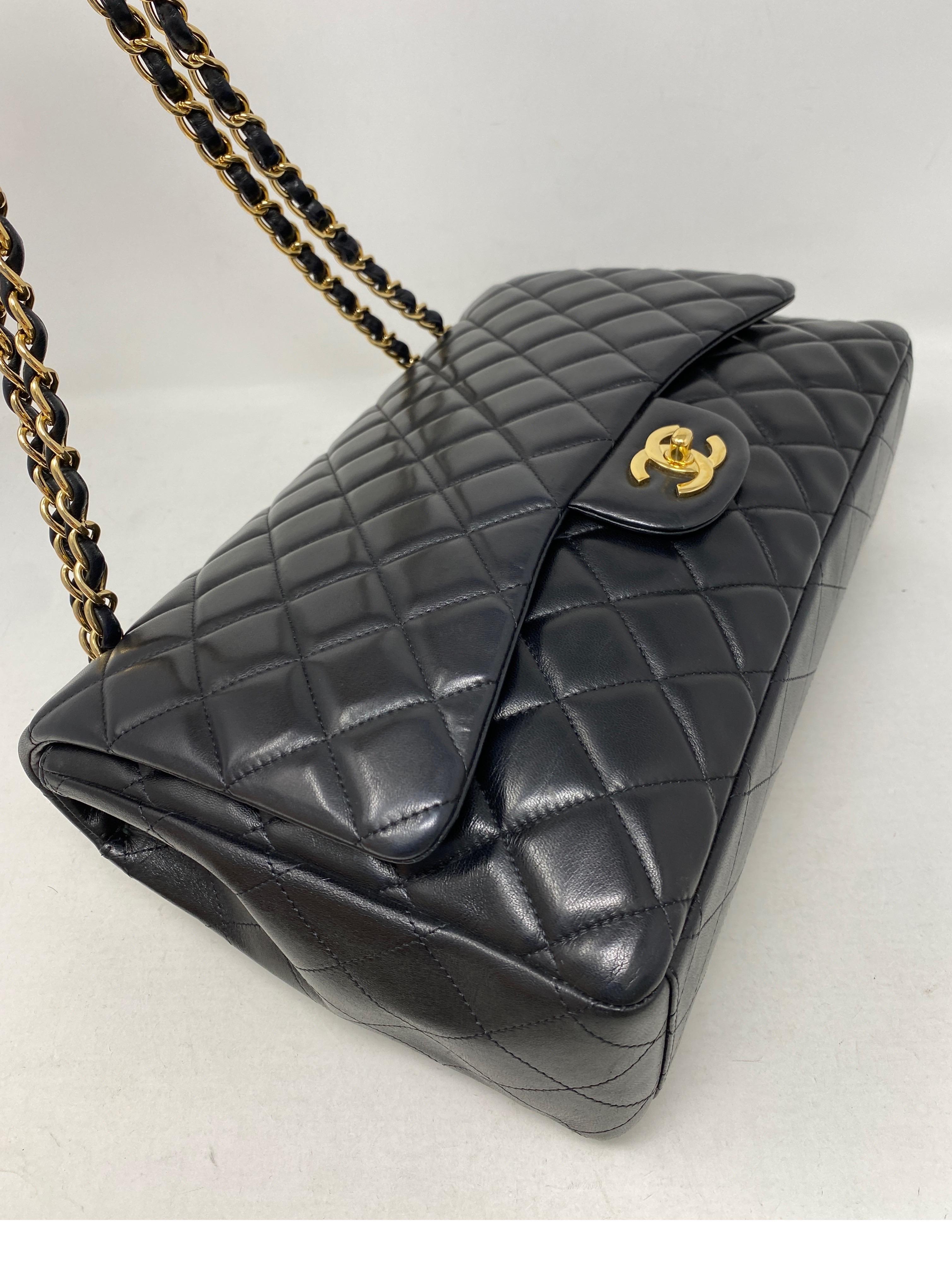 Women's or Men's Chanel Black Maxi Lambskin Single Flap Bag 