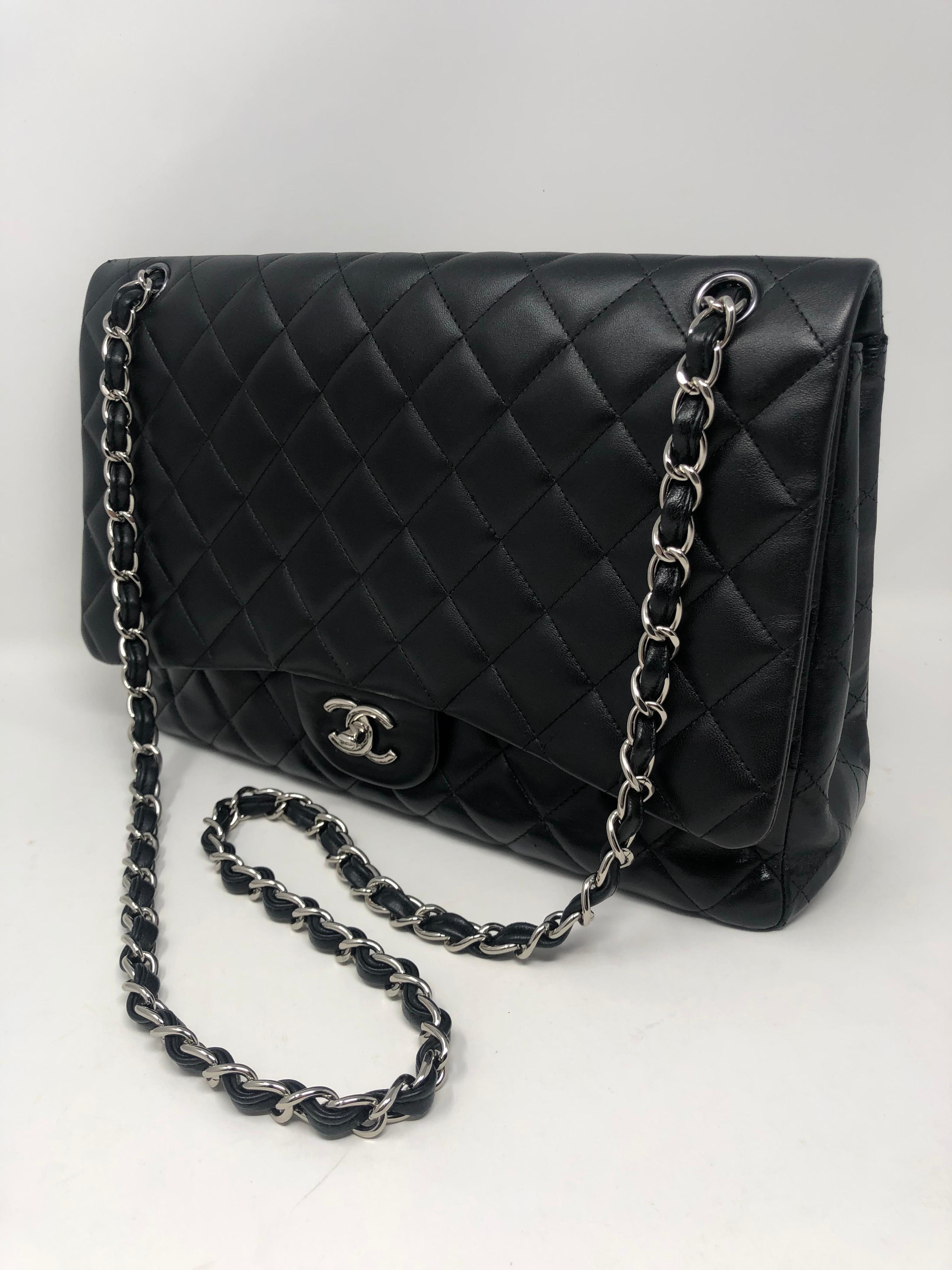 Chanel Black Maxi Single Flap Bag. Bag was originally silver color and was recently redyed black. The interior is still silver and in good condition. Please note the black is not the original color. The bag has been be redyed by a leather