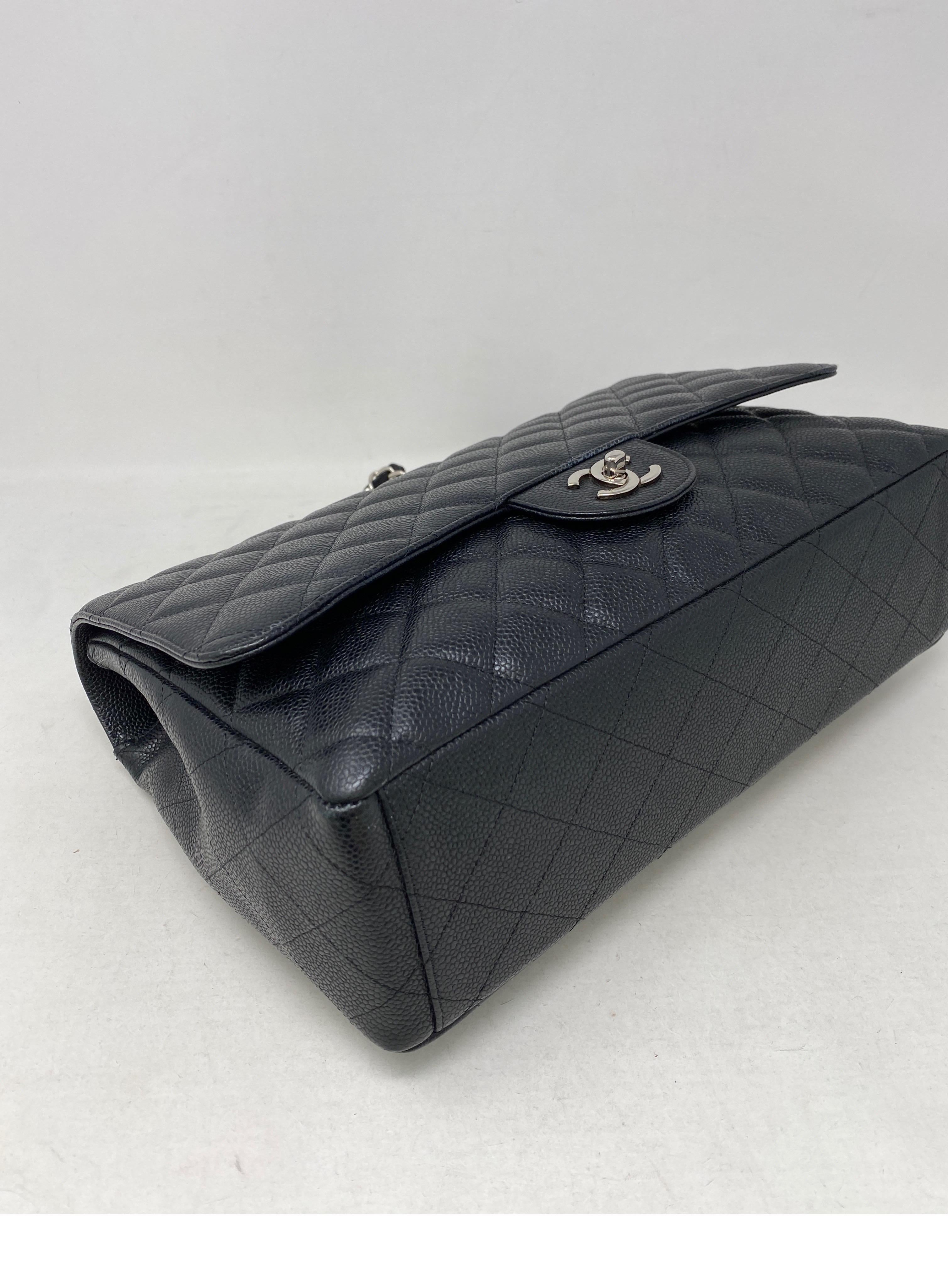 Women's or Men's Chanel Black Maxi Single Flap Bag 