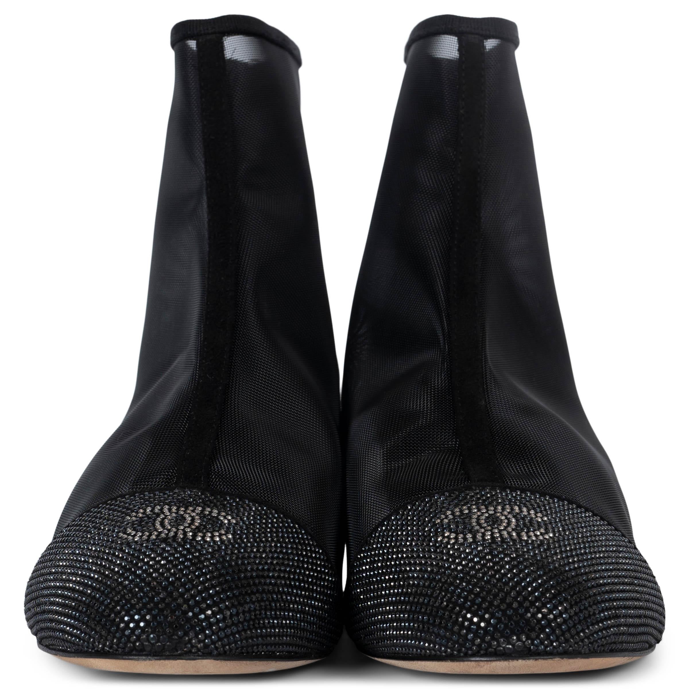100% authentic Chanel ankle boots in black mesh. Features crystal embellished toe cap with CC, suede trims and block heel. Open with zippers in the back. Have been worn once or twice and are in excellent condition. 

2020