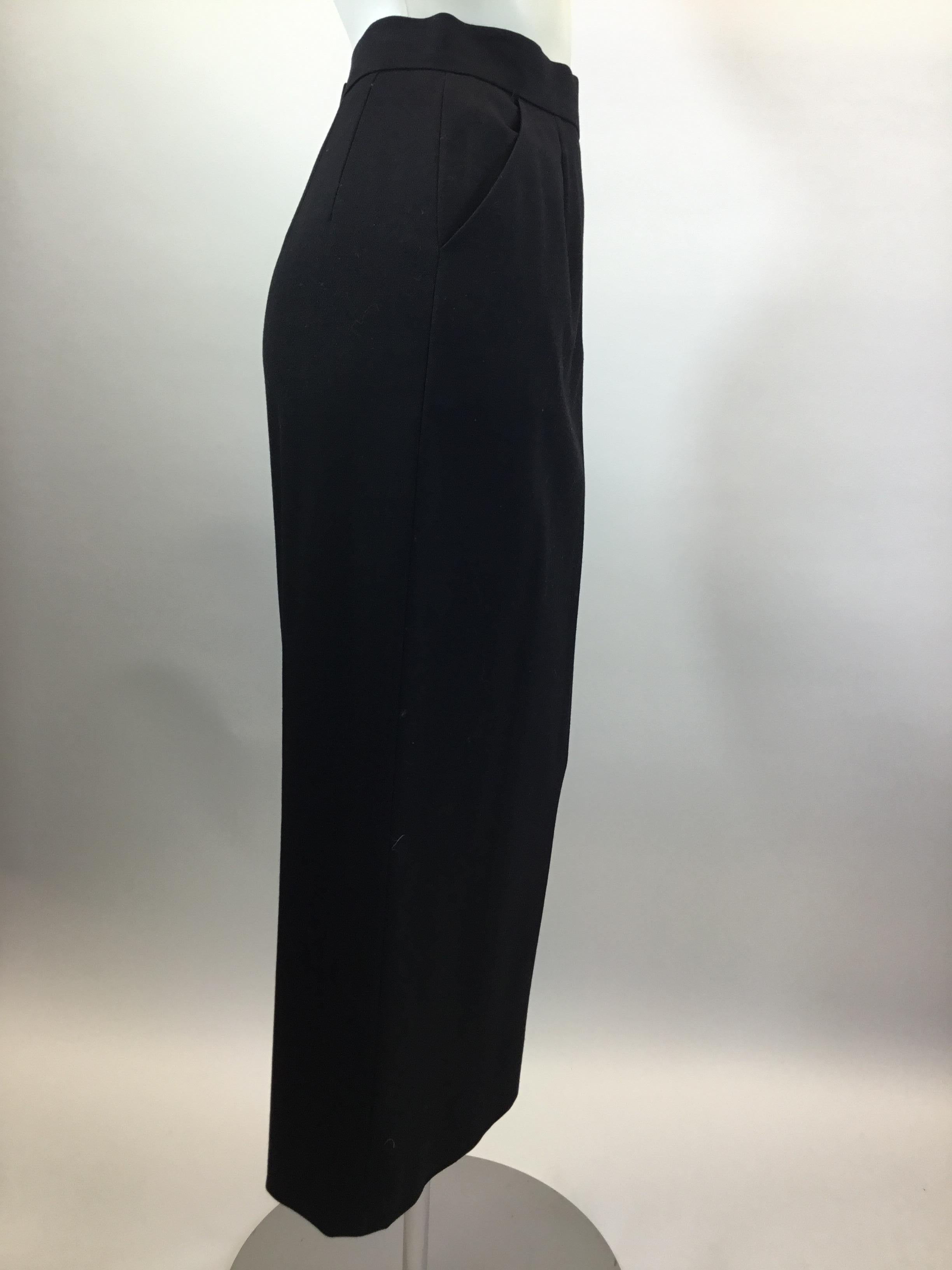 Women's Chanel Black Mid-Length Skirt with Gold Buttons For Sale