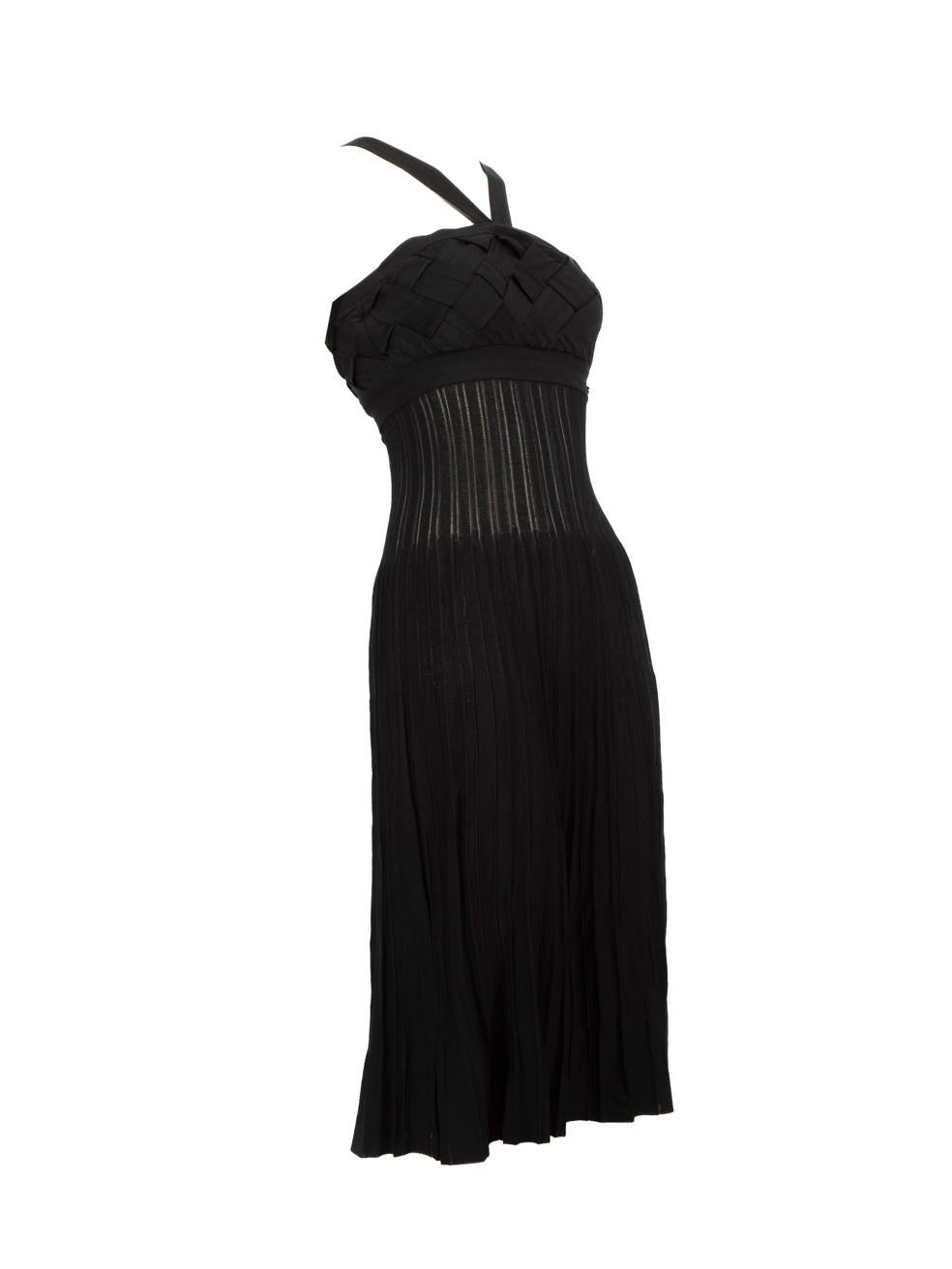 CONDITION is Very good. Minimal wear to the dress is evident, the stitching on the back left side is loose on this used Chanel designer resale item.
 
 
 
 Details
 
 
 Black
 
 Viscose
 
 Dress
 
 Midi
 
 Sleeveless
 
 Pleated skirt
 
 Buttoned