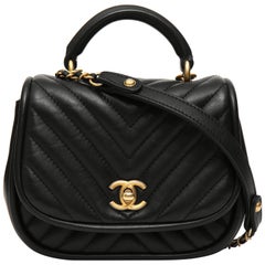 Chanel black mini lady chevron shoulder bag