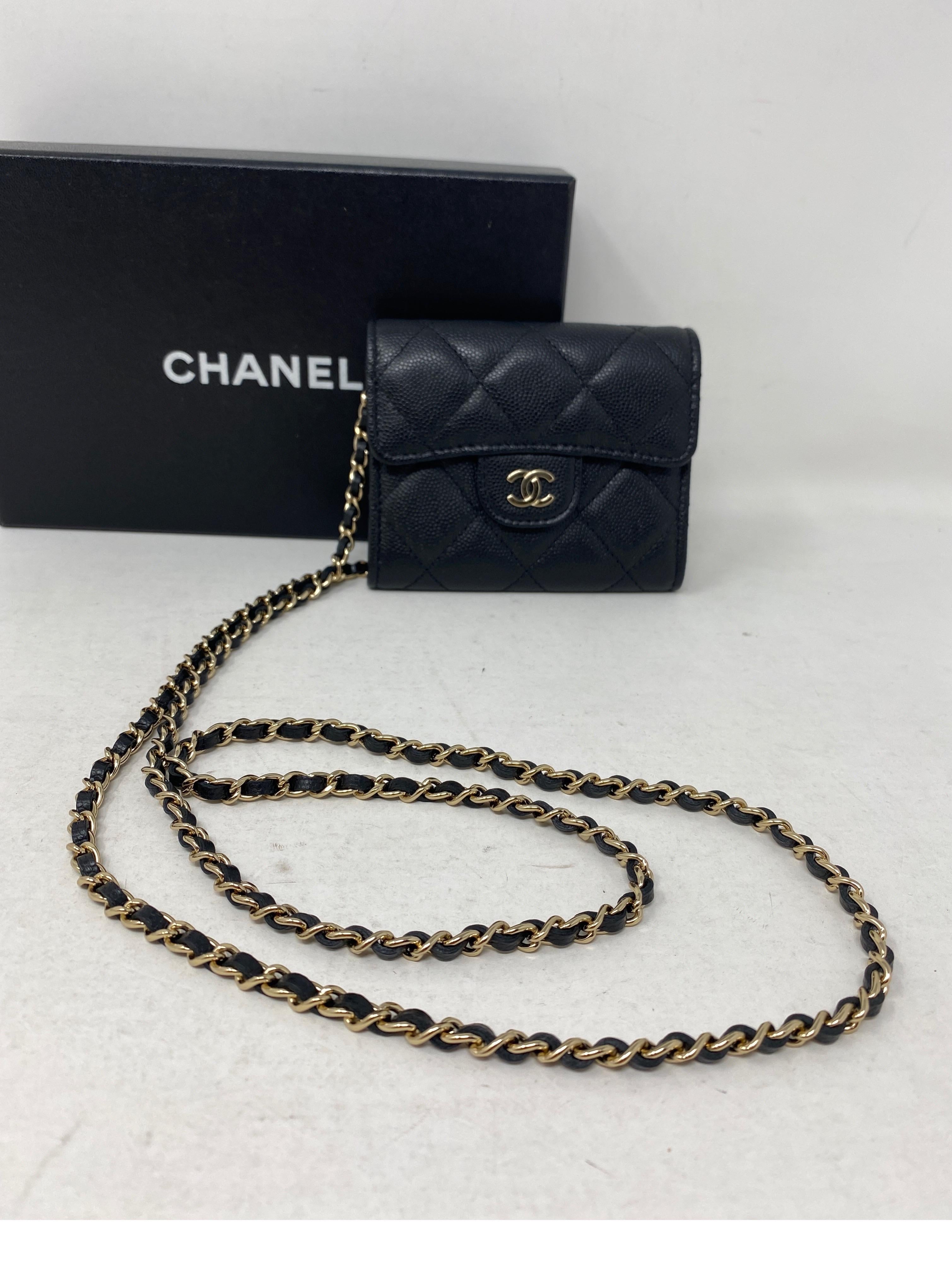 Chanel Black Very Mini Crossbody Bag. Cute little black crossbody bag. Minature size. Mint condition. Like new. Rare and limited. Guaranteed authentic. 