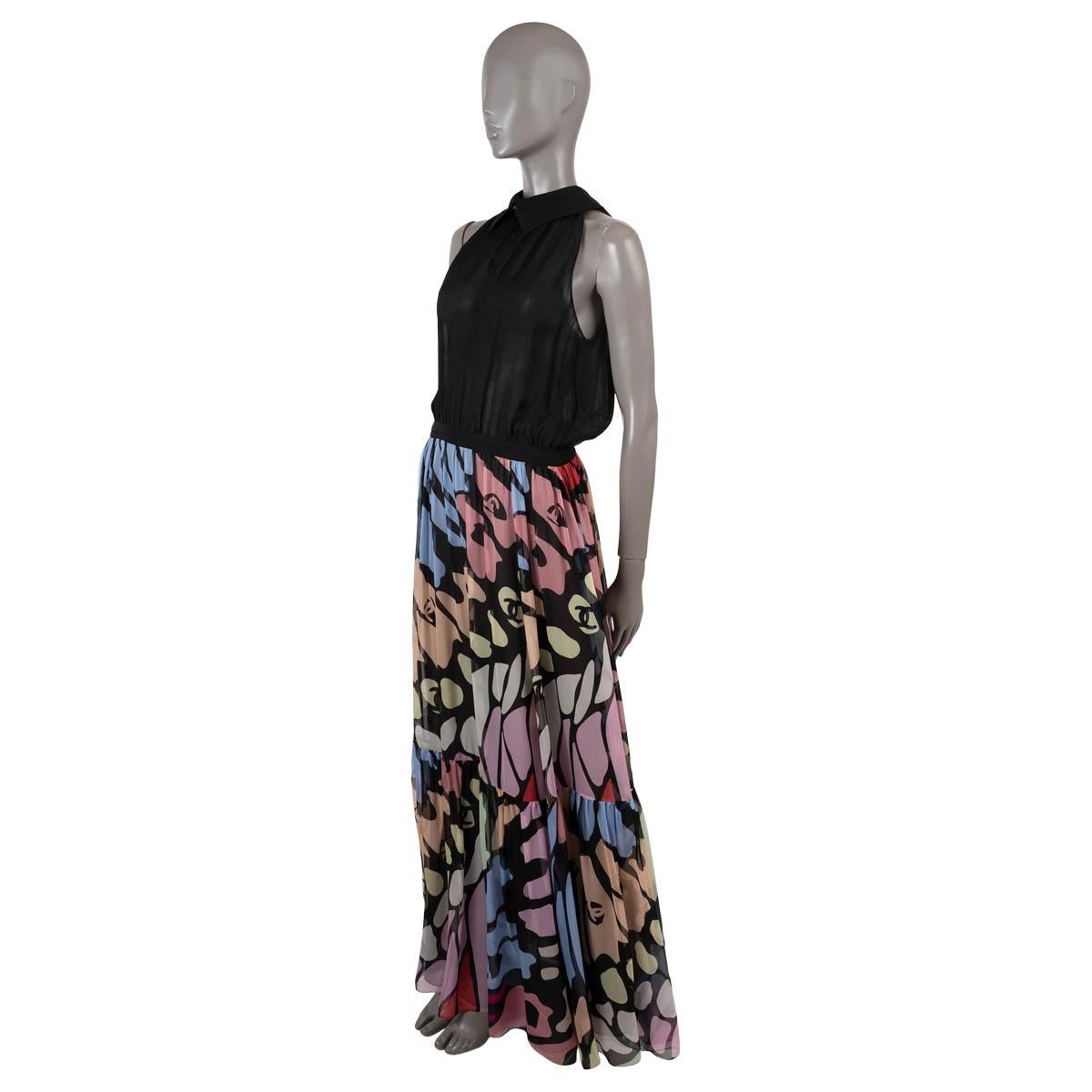 100% authentic Chanel floral maxi dress in black and multicolor silk chiffon (100%). Features semi-sheer top with collar and two decorative buttons on the front that opens with gold-tone CC buttons in the back and a floral chiffon skirt thats opens