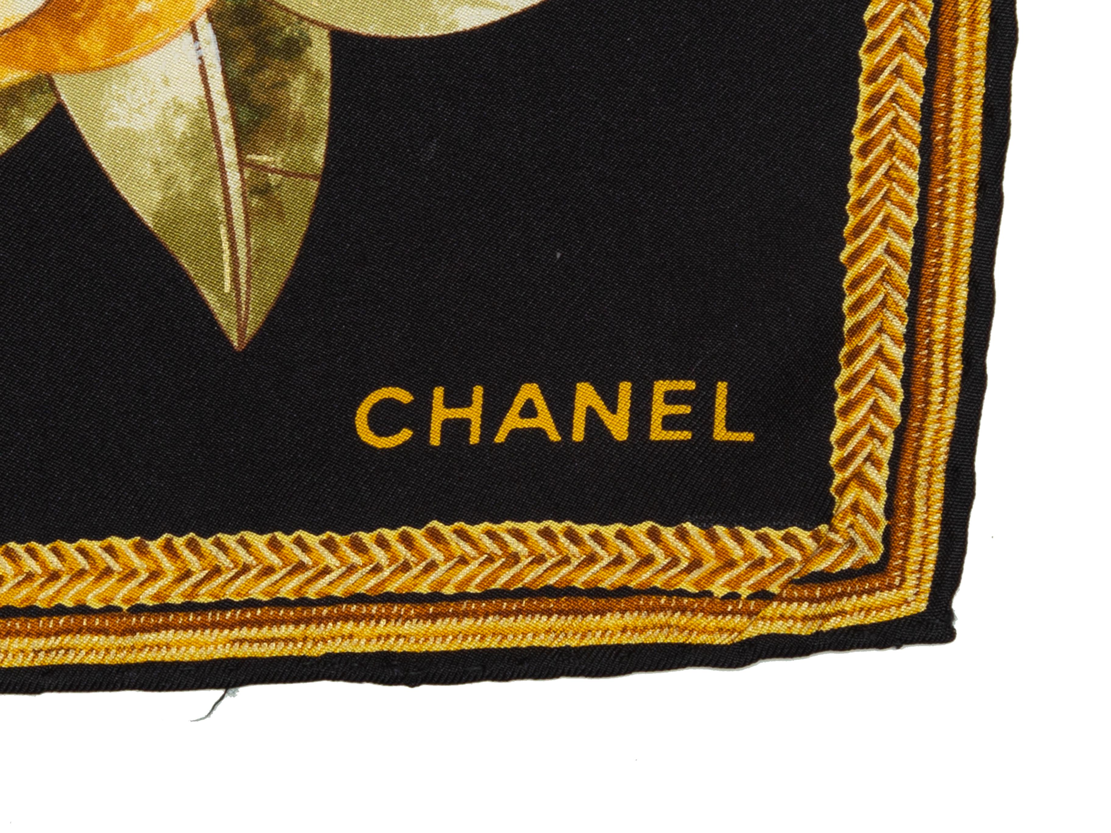 Product details: Black and multicolor silk scarf by Chanel. Rose floral print throughout. 34