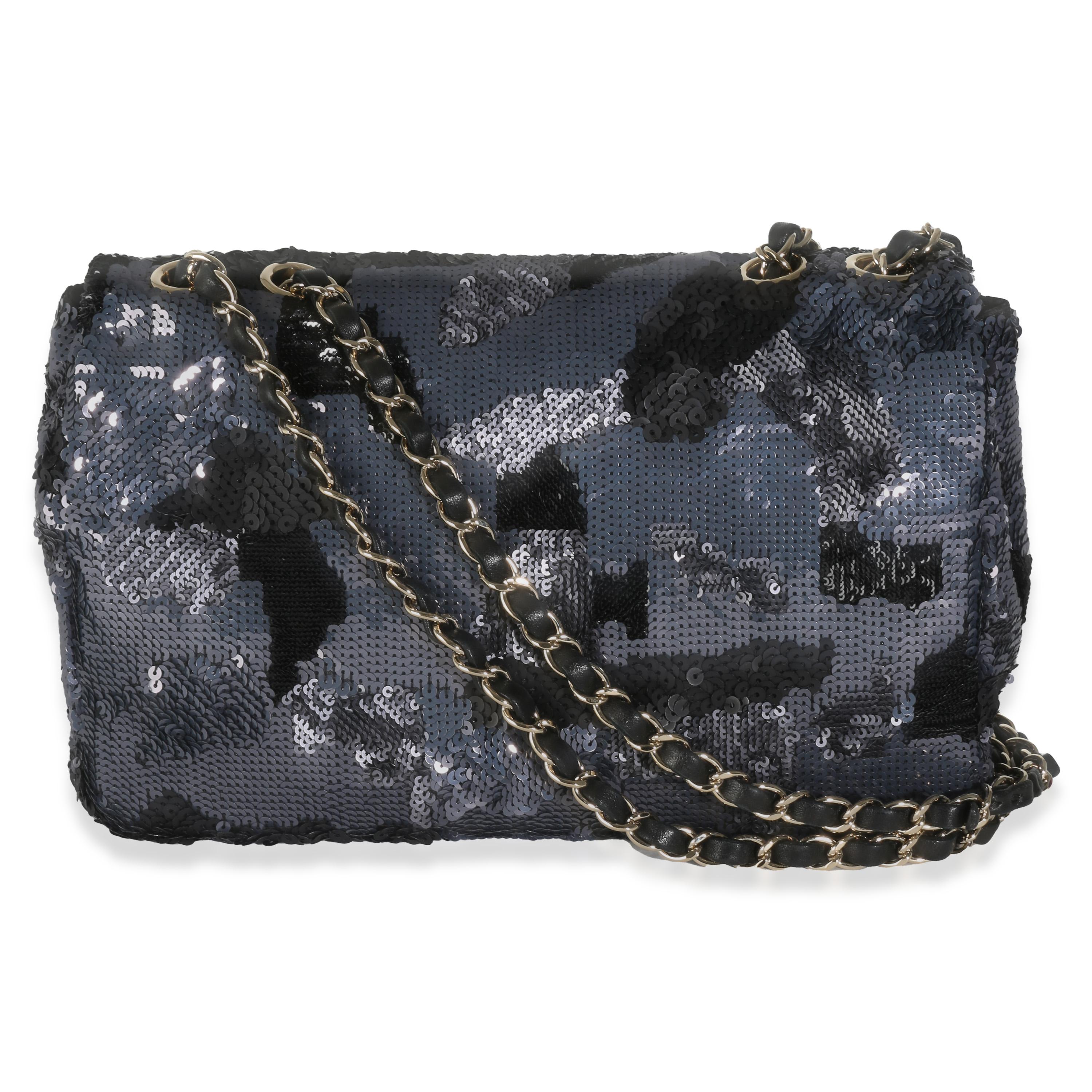 Listing Title: Chanel Black Navy Camo Sequin Medium Single Flap Bag
SKU: 142473
Condition: Pre-owned 
Condition Description: A timeless classic that never goes out of style, the flap bag from Chanel dates back to 1955 and has seen a number of