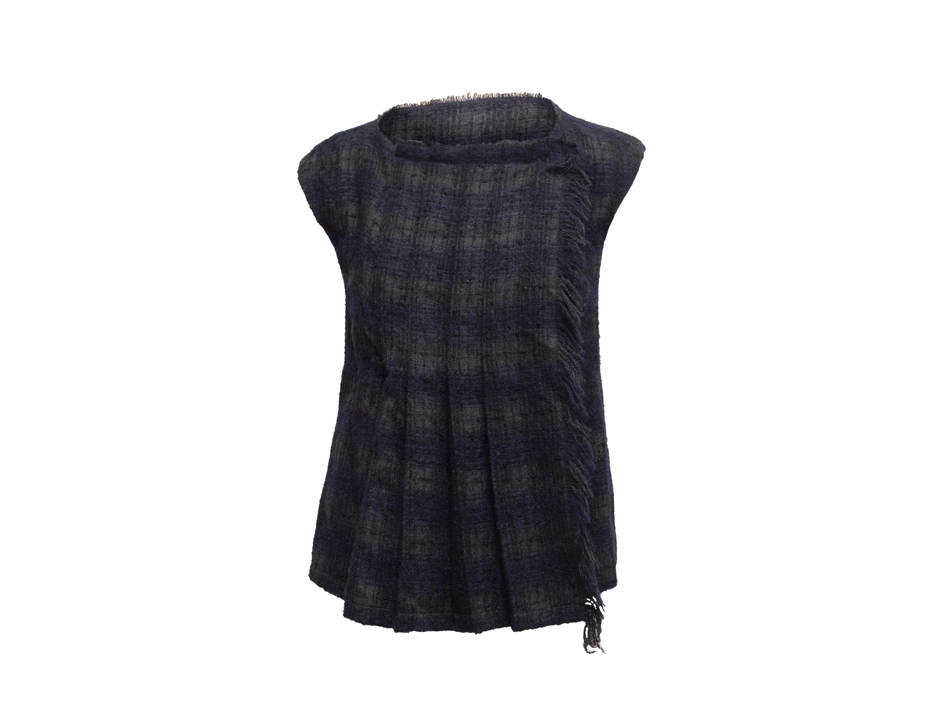 Product details: Black and navy wool-blend raw-edge sleeveless top by Chanel. Plaid pattern throughout. Round neckline. Closure at front. Designer size 38. 32