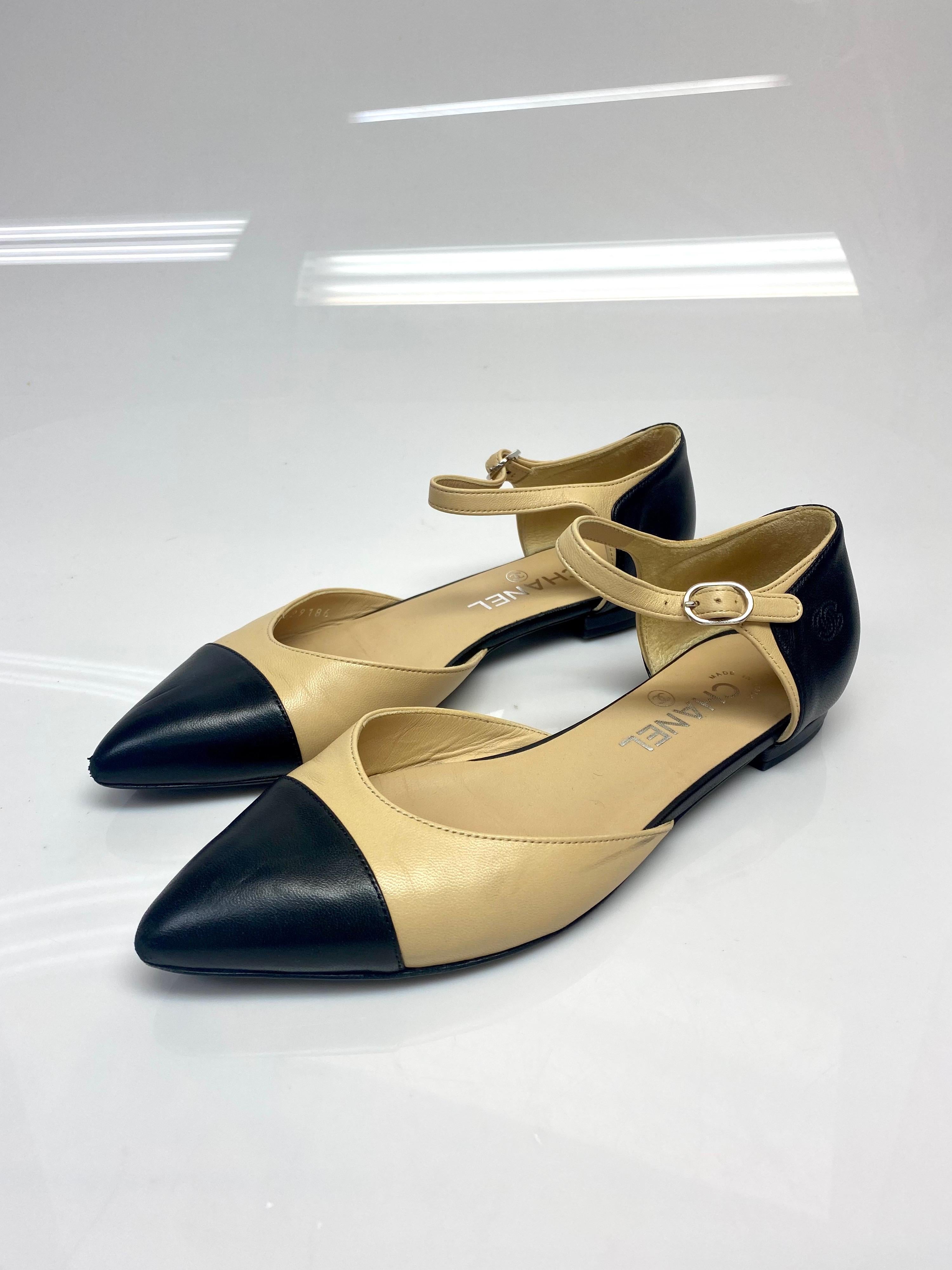 chanel nude and black flats