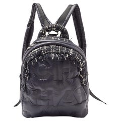 Used Chanel Black Nylon and Tweed Doudoune Backpack