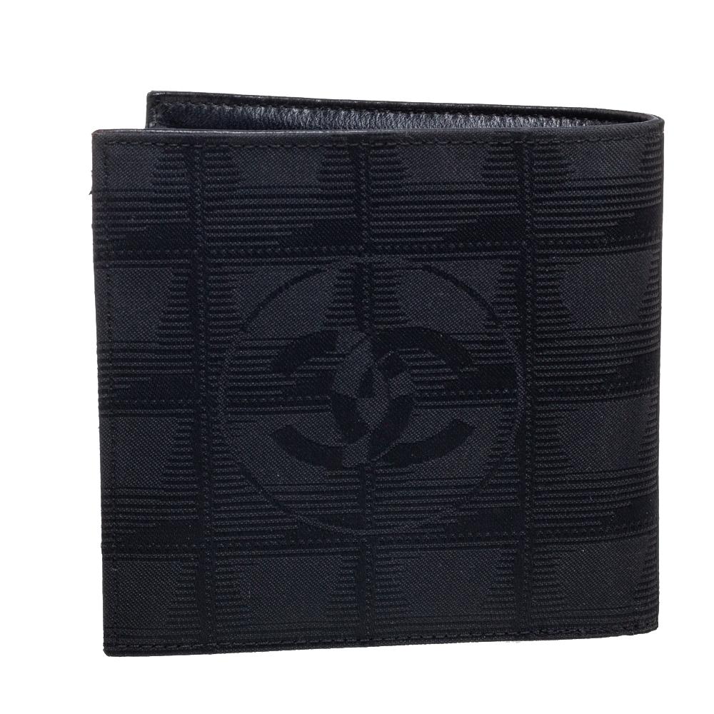 Match your Chanel purse with a Chanel wallet! Your essentials can be carried effortlessly in this CC Travel Line bifold wallet. Equipped with compartments and card slots, it makes for a great everyday accessory.

Includes: Authenticity Card
