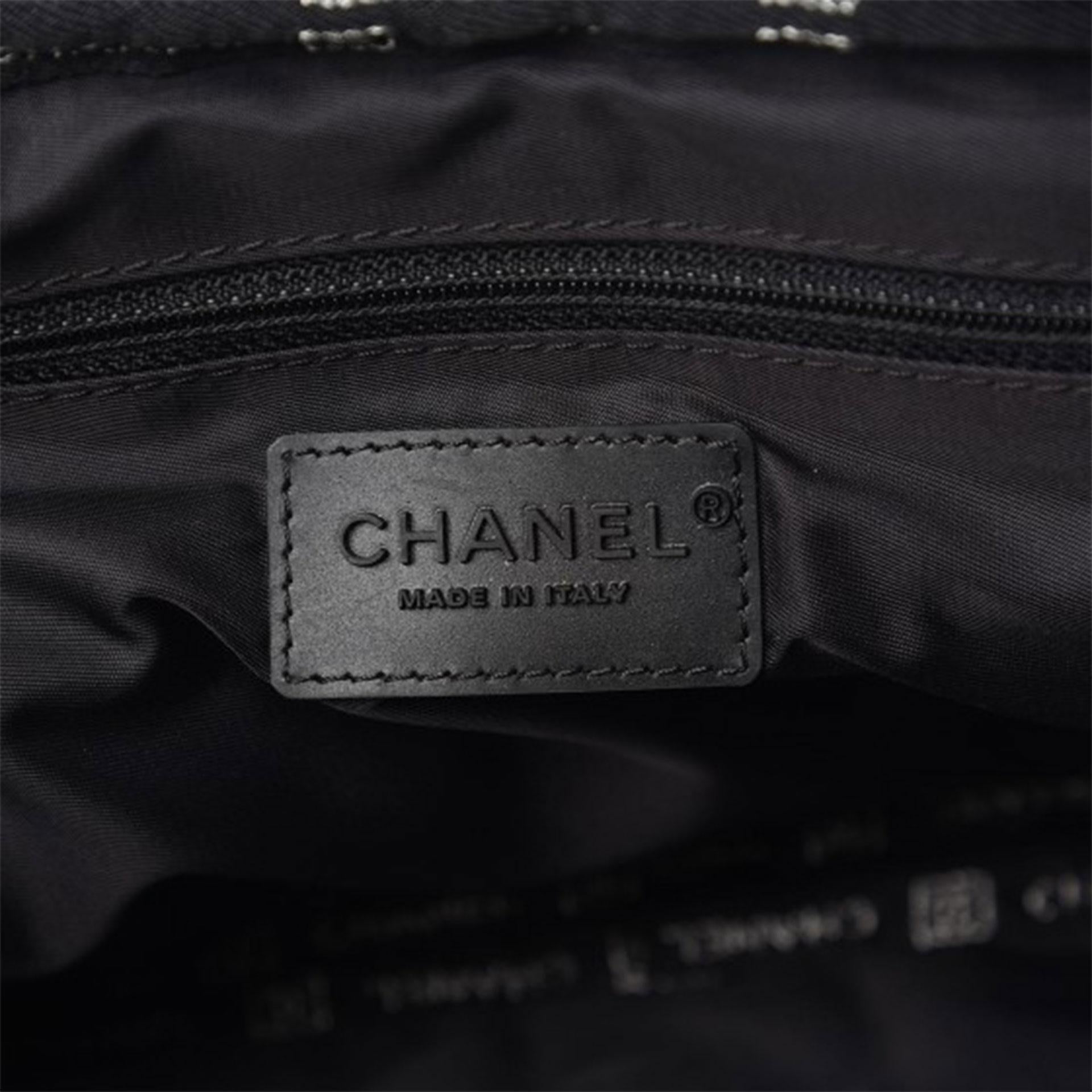 Women's or Men's Chanel 2005 Vintage Rare Black Nylon Coco Niege Sport Duma Clasic Flap Backpack For Sale