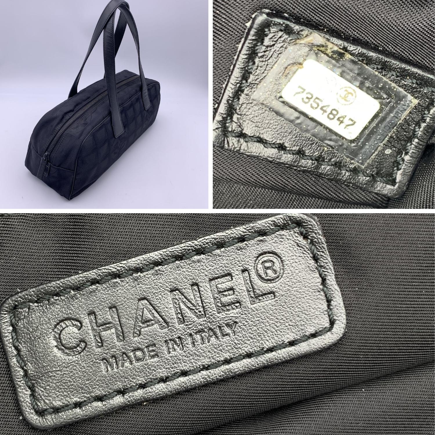 Chanel Black Nylon Travel Line Bassotto Top Handle Bag In Excellent Condition In Rome, Rome