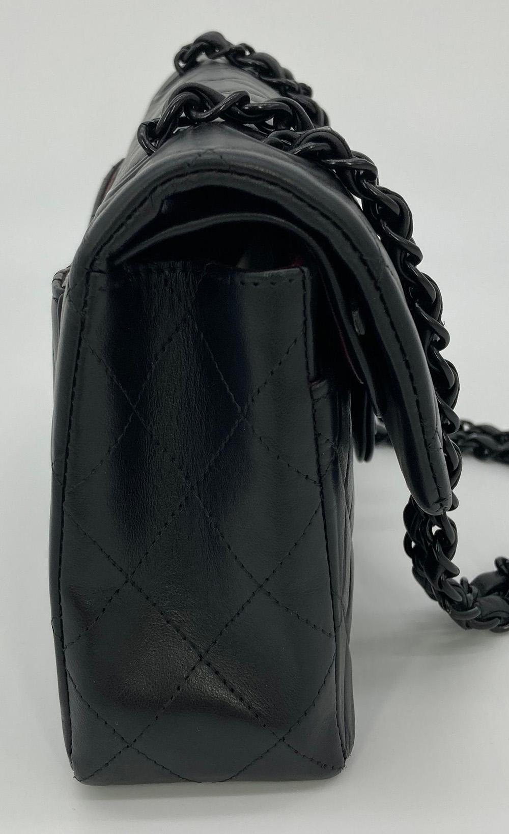 Chanel Black on Black 9 inch Small 2.55 Double Flap Classic in excellent condition. Black quilted exterior trimmed with black hardware and woven black leather and black chain shoulder strap. CC twist lock closure opens via double flap to a black and
