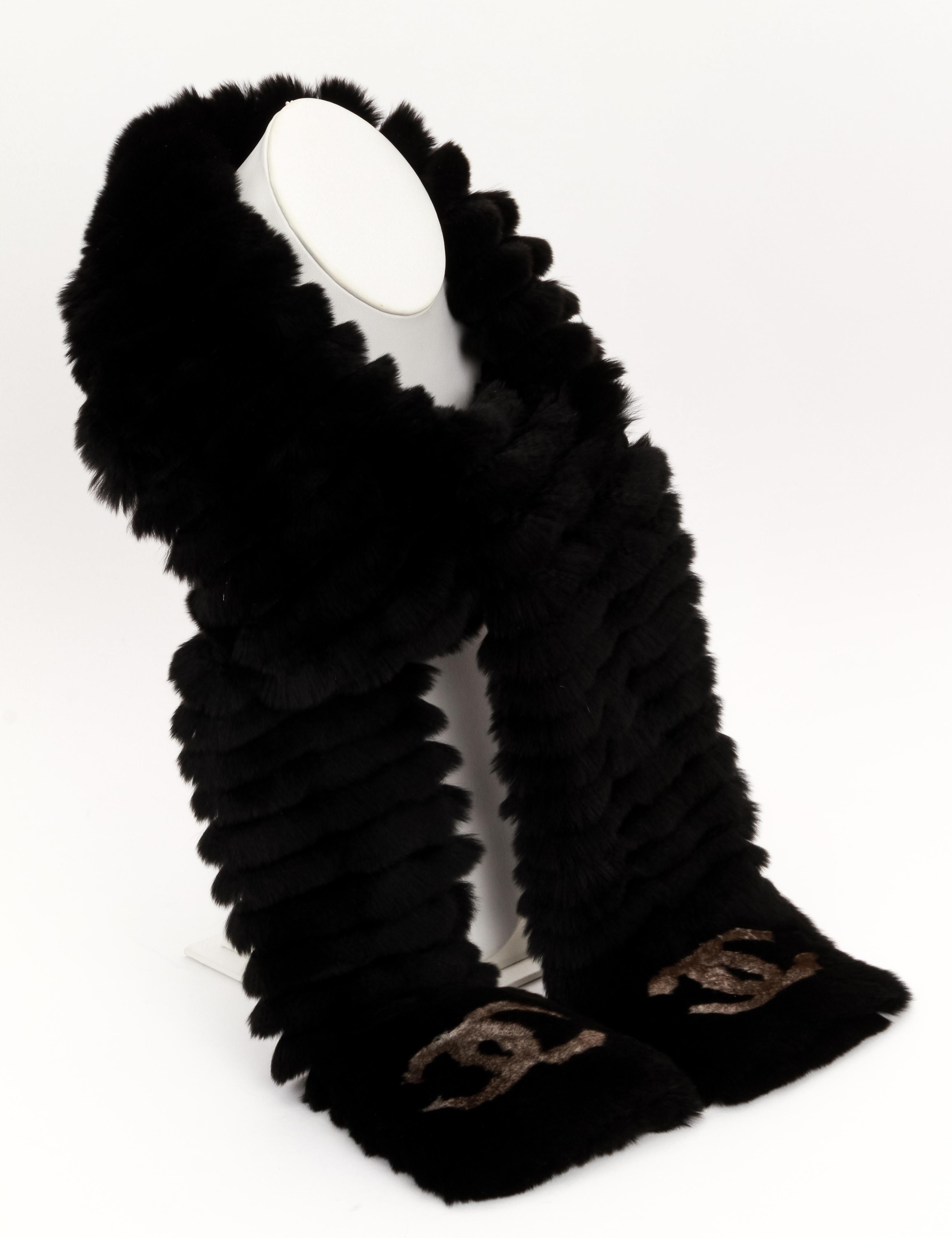 Chanel mint condition black orylag fur scarf . Chanel cc in contrast color. Original care tag and dust cover.