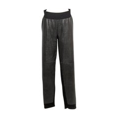 Pantalon noir à bandes de cuir de Chanel