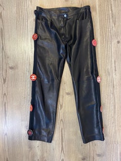Chanel black pants with pins.